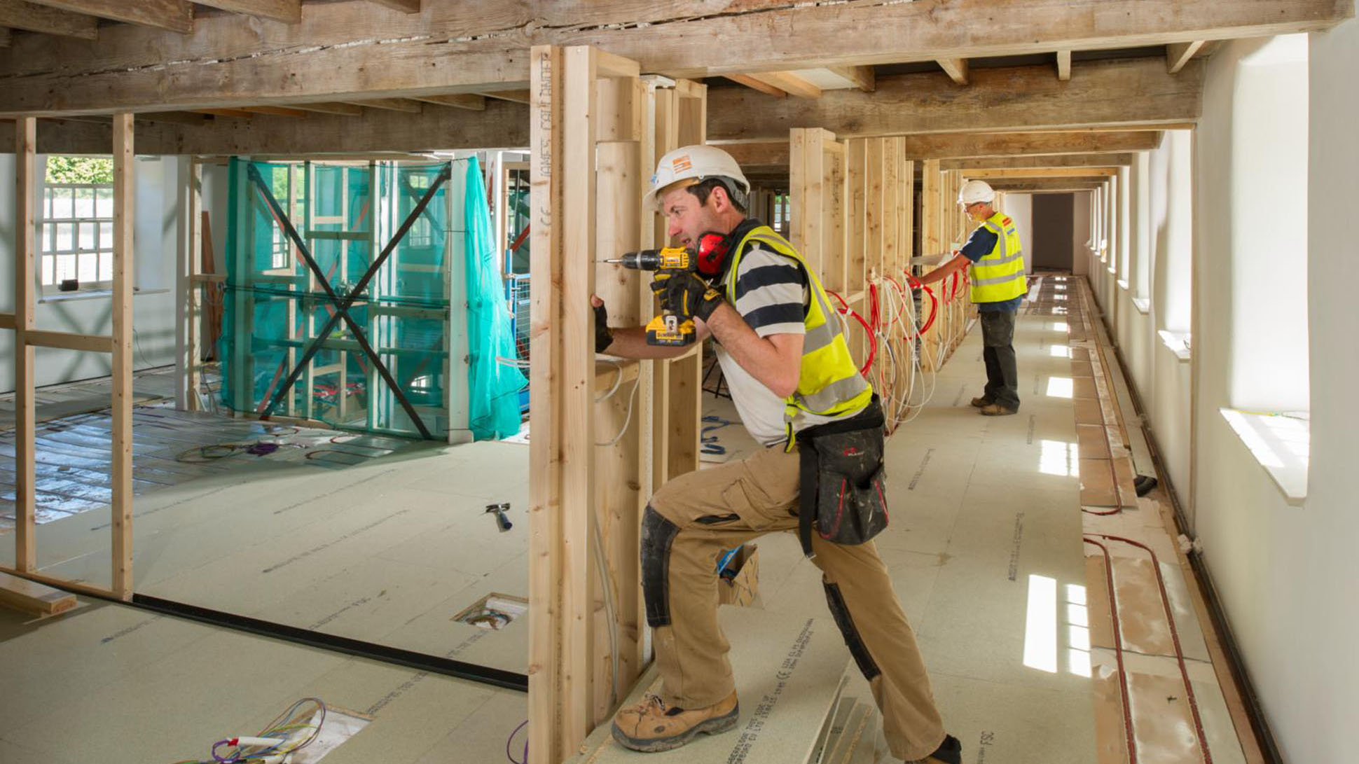 Workmen working on the restoration of Cromford Mill