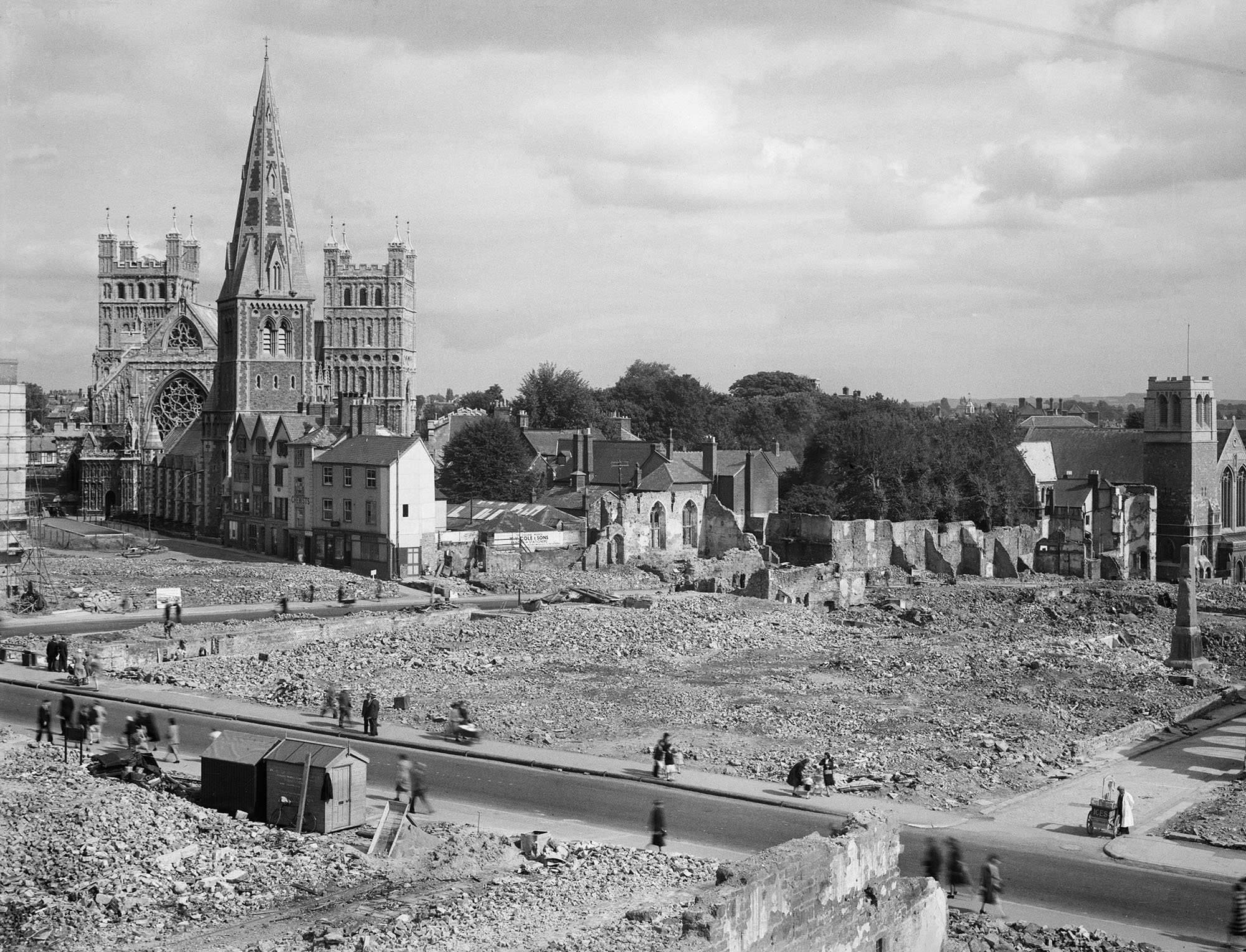 Cathedral in background with flattened streets and rubble in the foreground