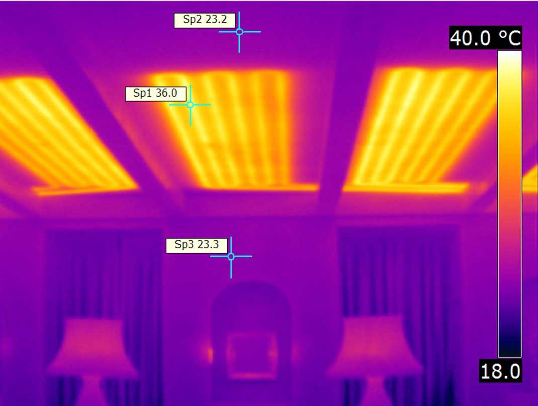 A thermal image of part of the ceiling at Eltham Palace, different colours are used to show varying areas of heat.
