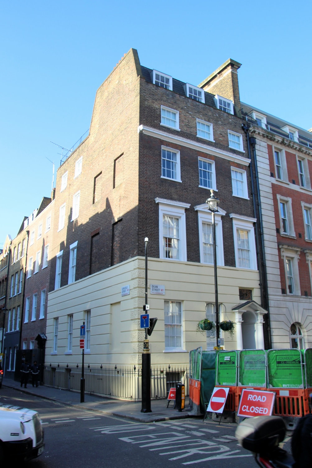 Georgian building on the corner of Dean Street and Carlisle Street.