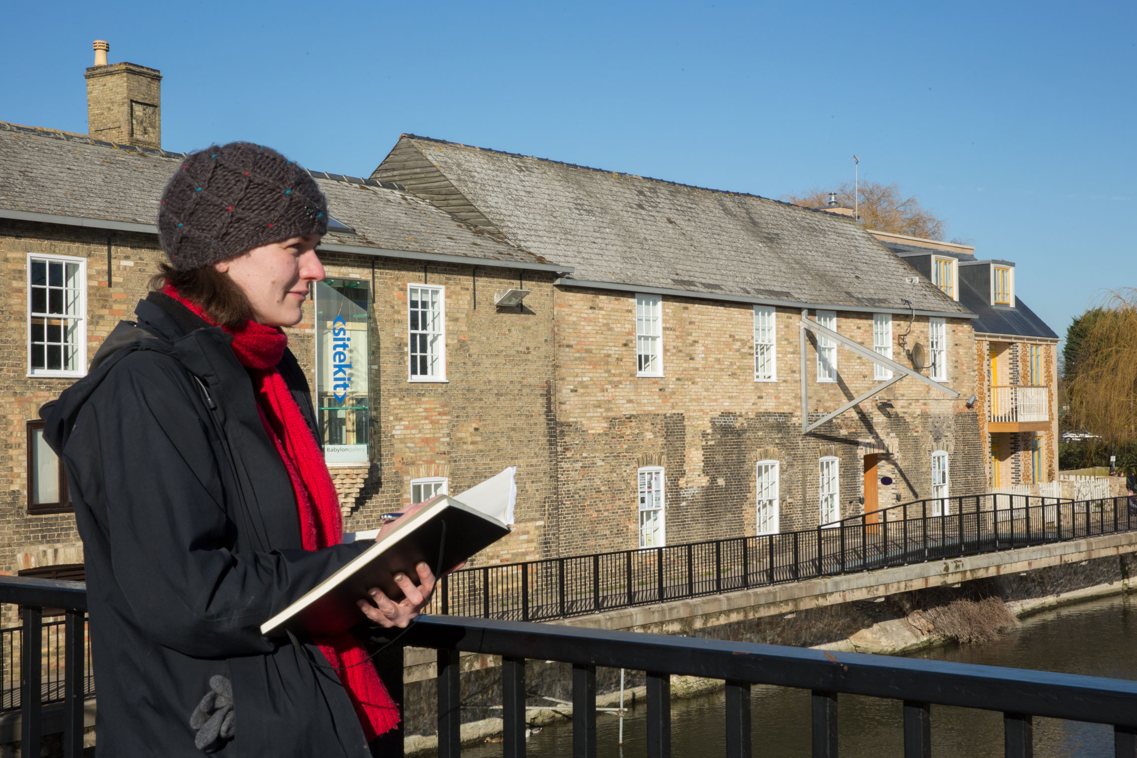 An investigator recording historic buildings.