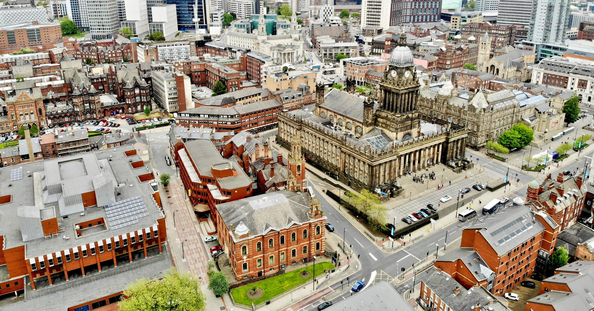 Aerial view of Leeds with a mixture of old and new buildings