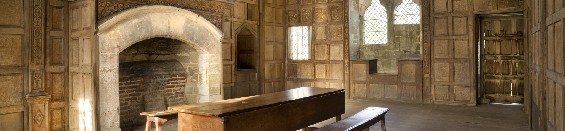 Timber panelled interior in a historic building.