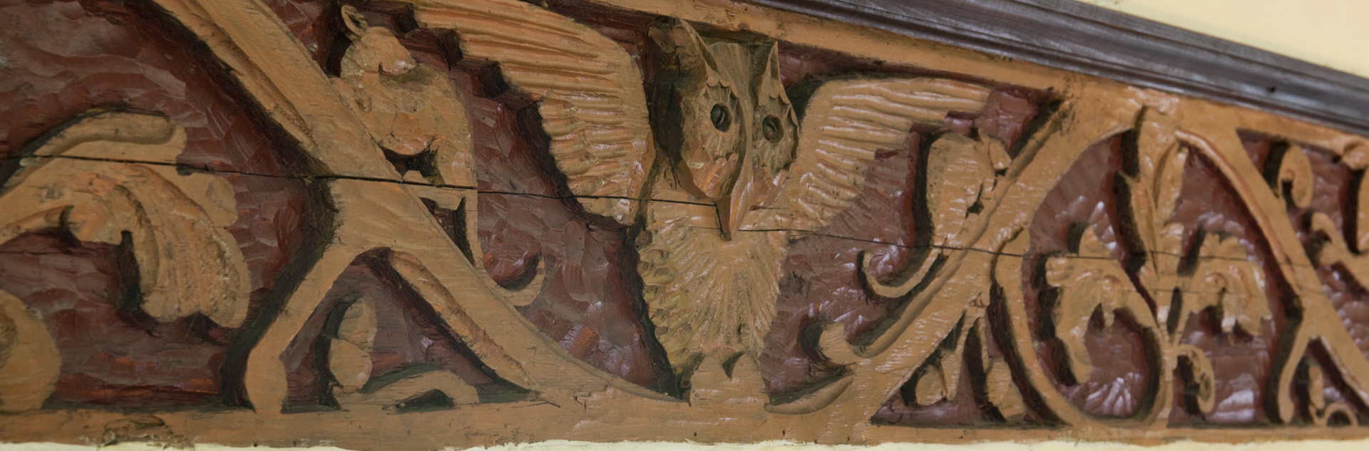 Animal wood carvings in beam