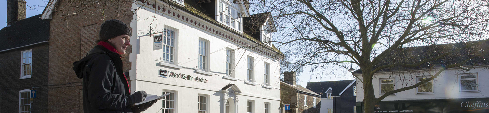 Surveying the market Place in Ely