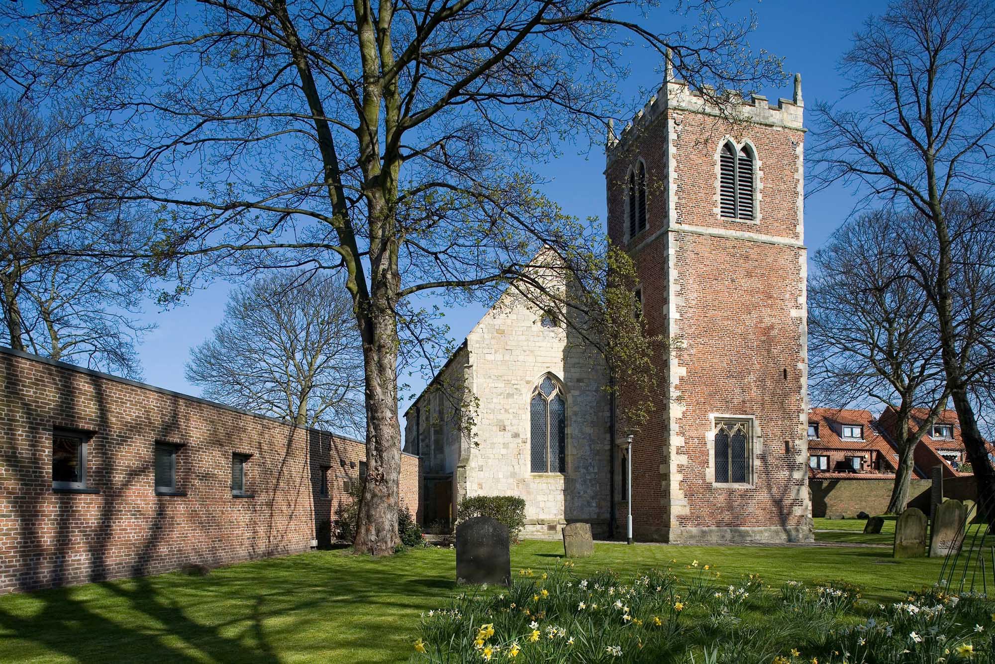 Image of the exterior of the National Centre for Early Music showing the medieval church of St Margaret, Walmgate, and the new extension.