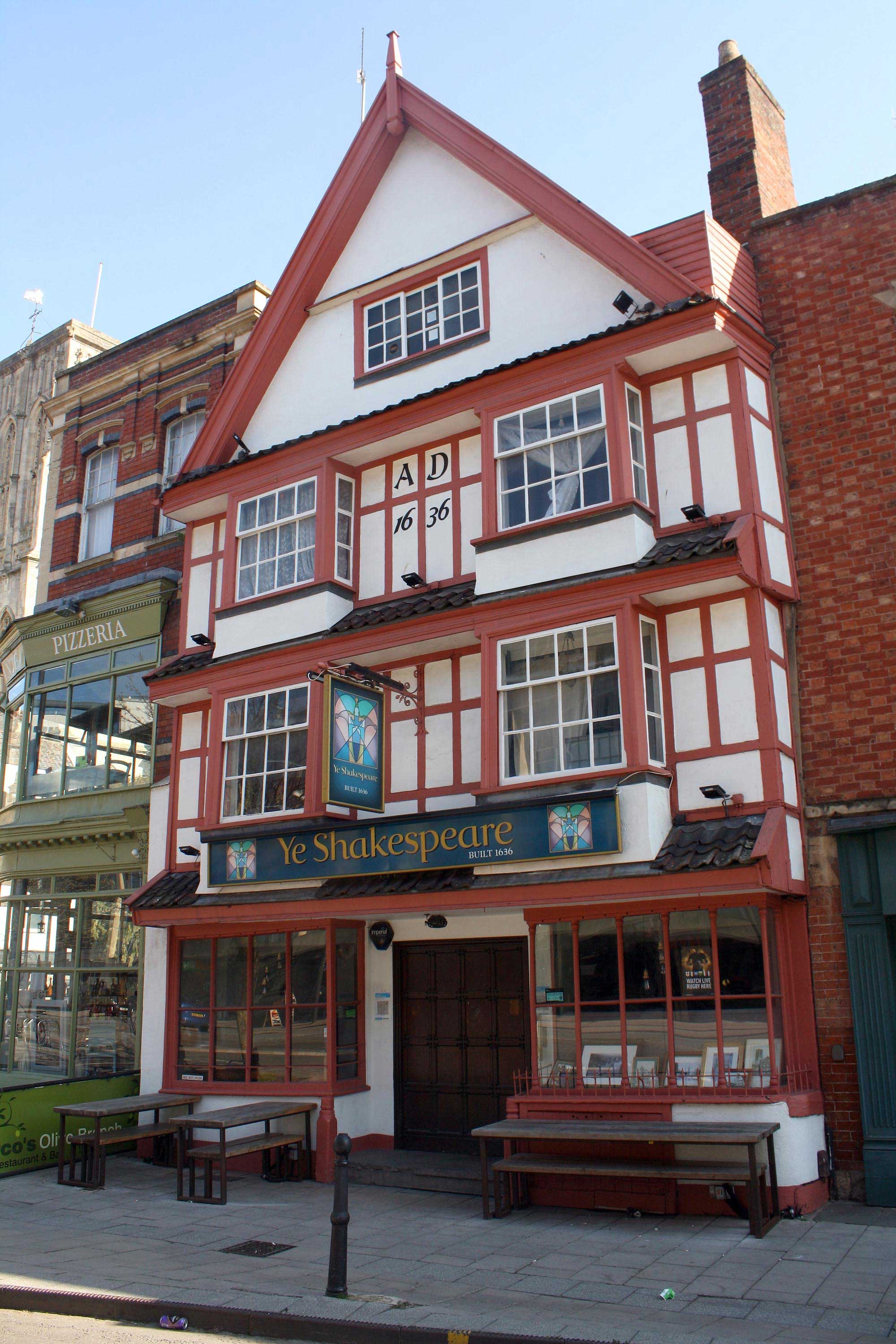 Upward angle street view of the front exterior of 'Ye Shakespeare' public house in Bristol, UK.