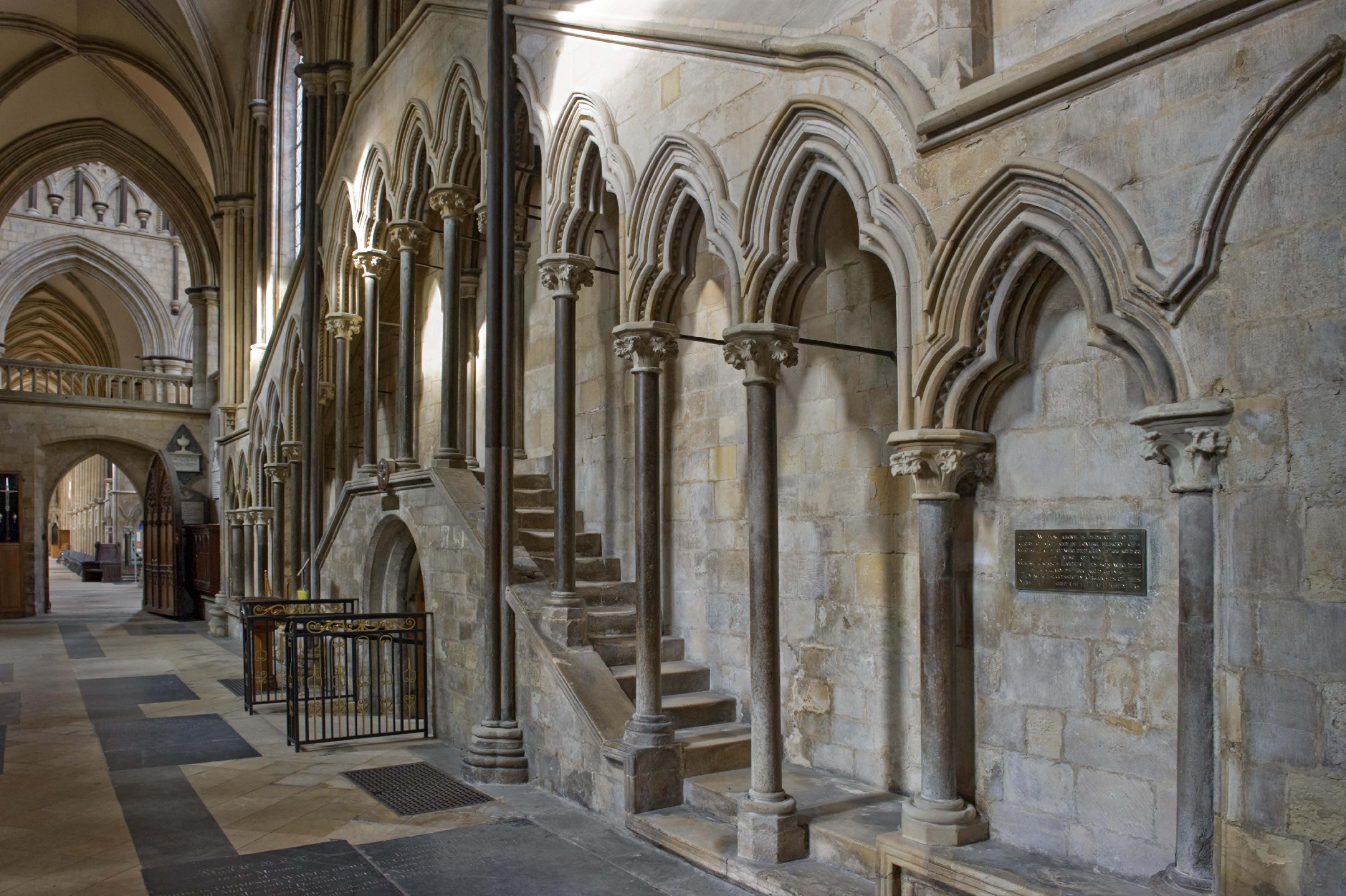 An architectural detail of masonry within a large church