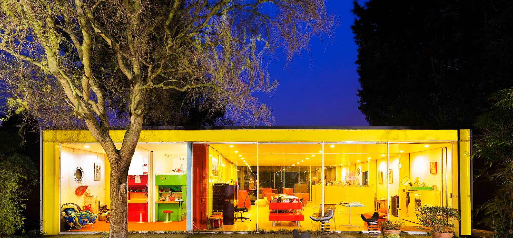 Exterior of a post-war house photographed in the evening