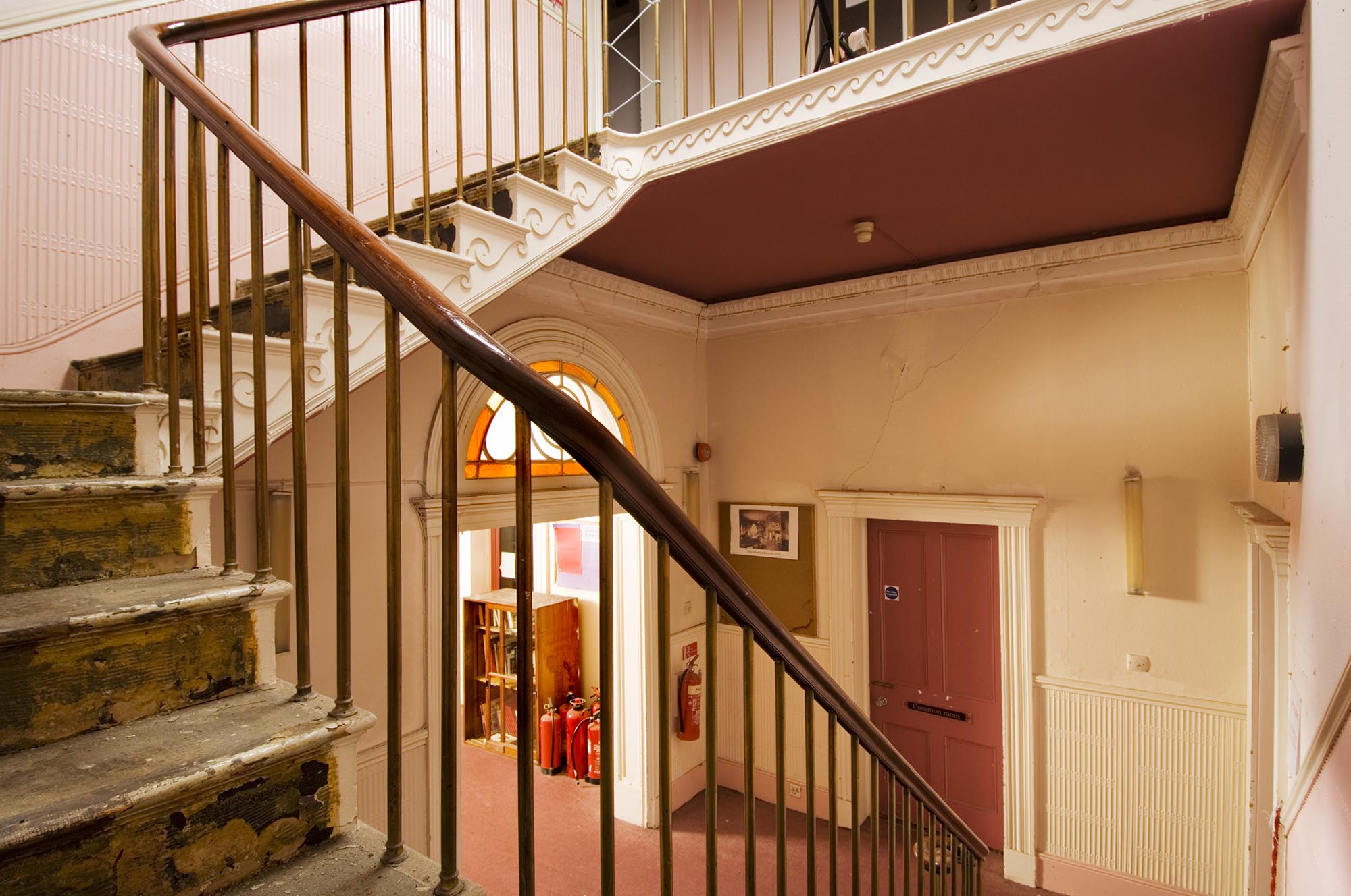 Interior view of the hall in Gaskell House, taken from the staircase