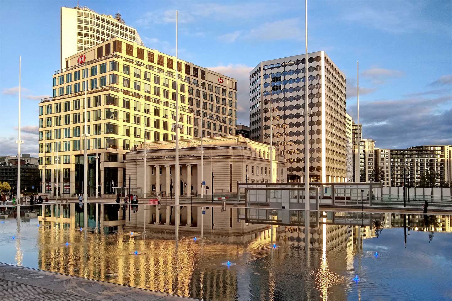 Multistorey office blocks surrounding an old building