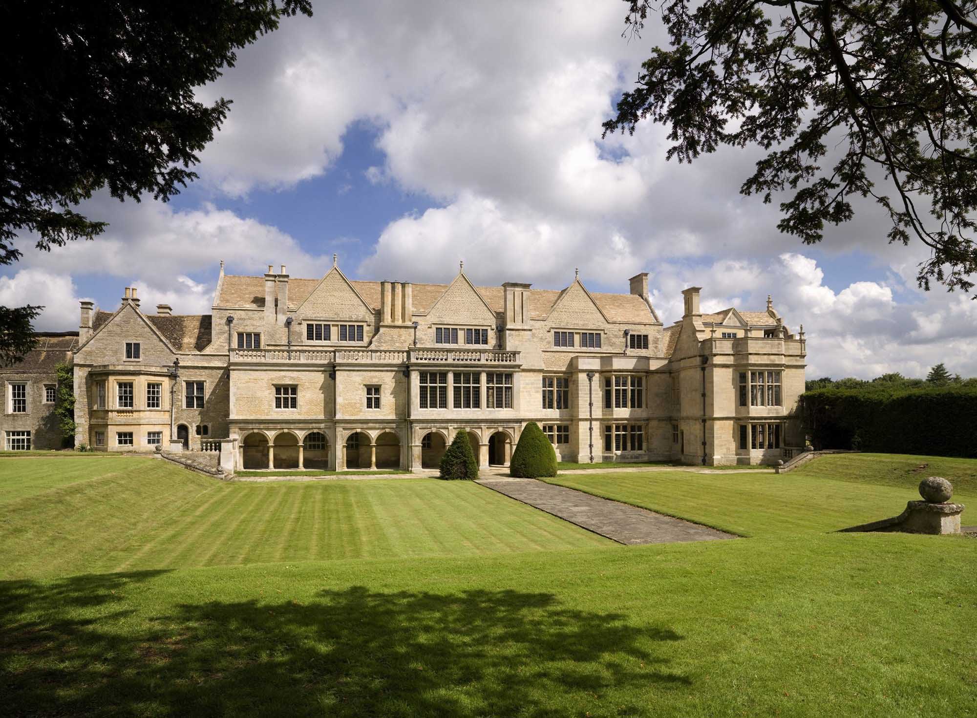 General view looking over the gardens to the east-facing elevation of the south range of Apethorpe Hall