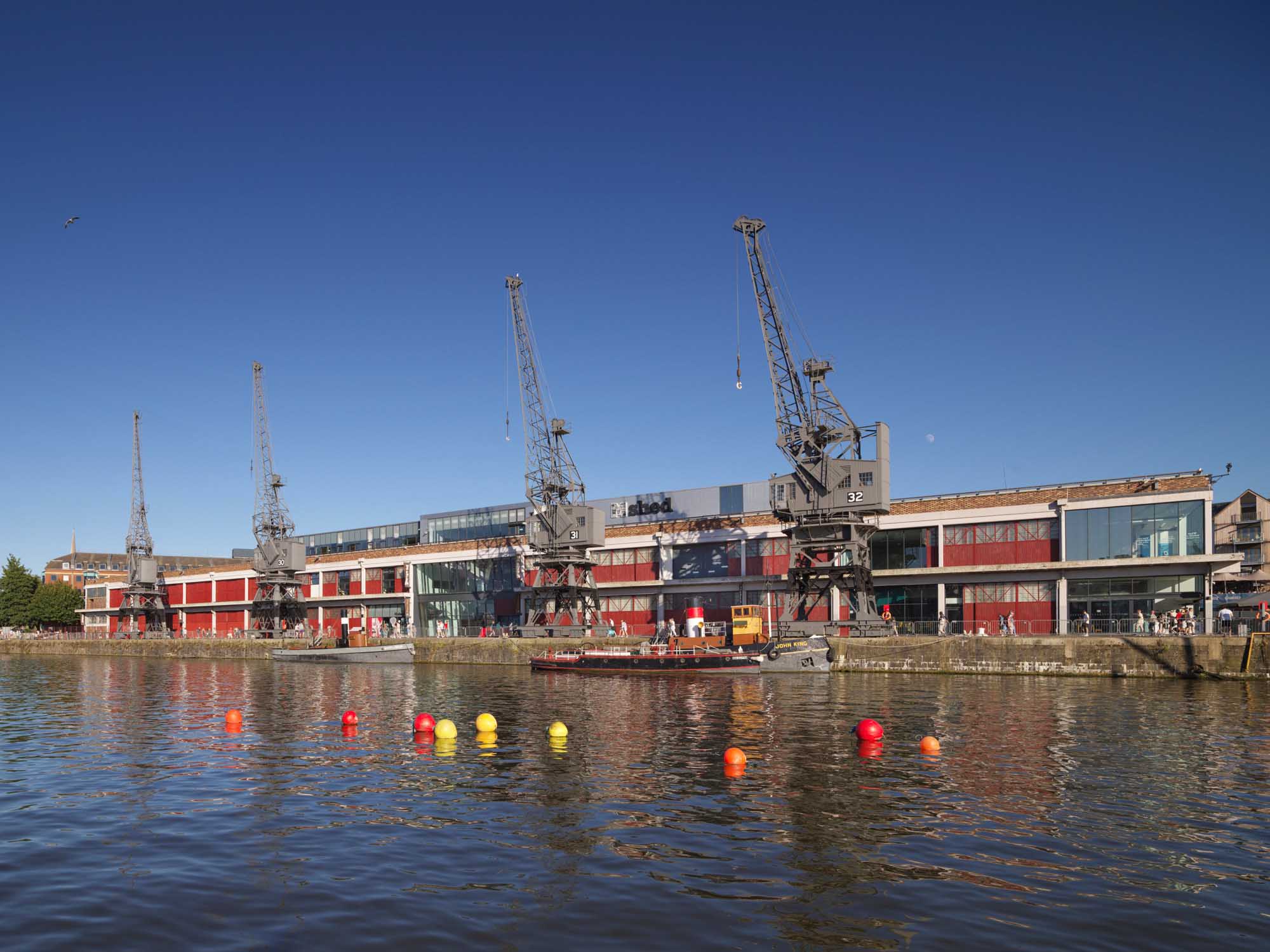 View from the north-west of travelling cranes 29, 30, 31 and 32 at Princes Wharf