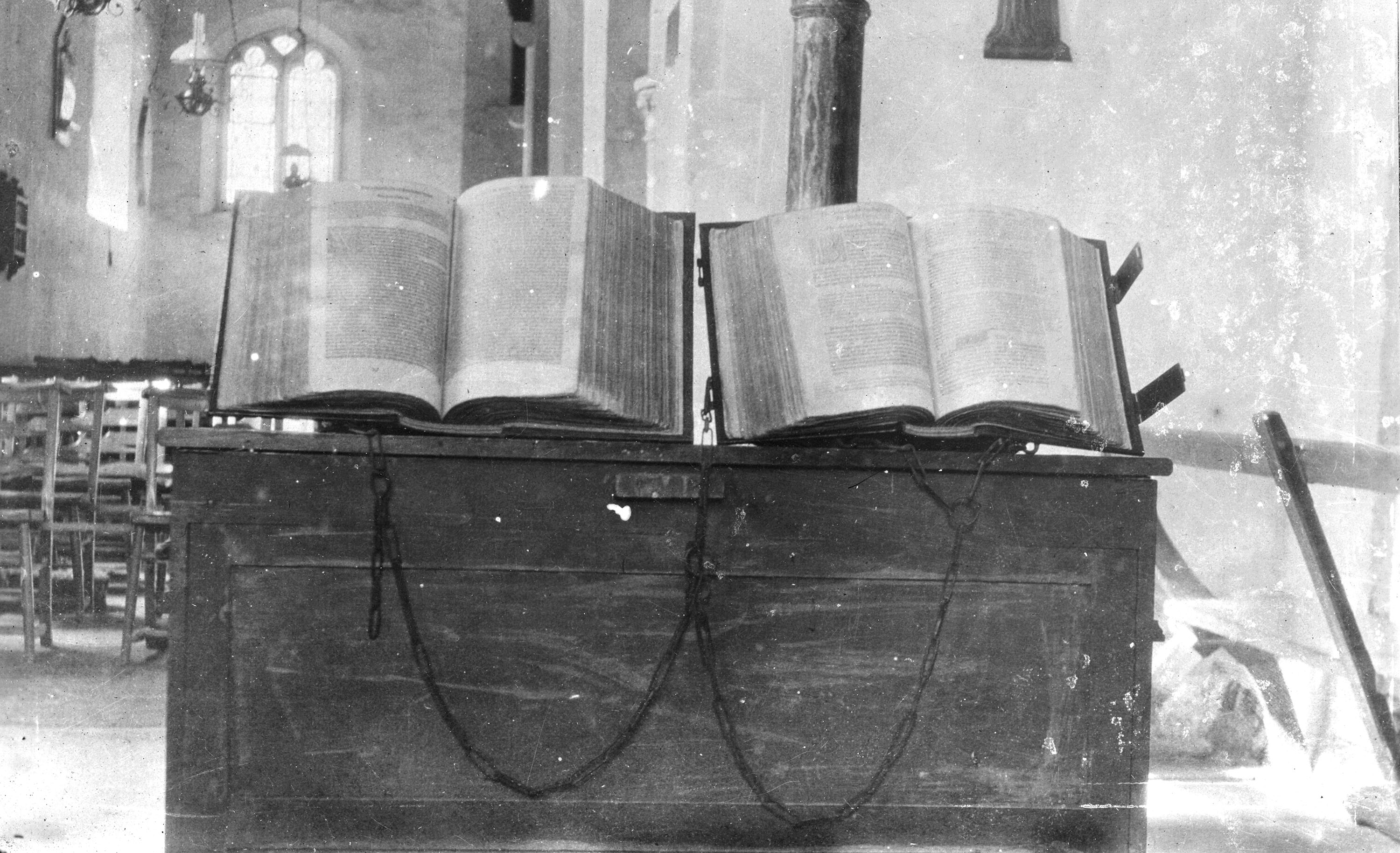 Two books chained to a desk inside St Michael's Church Blewbury, in 1909.