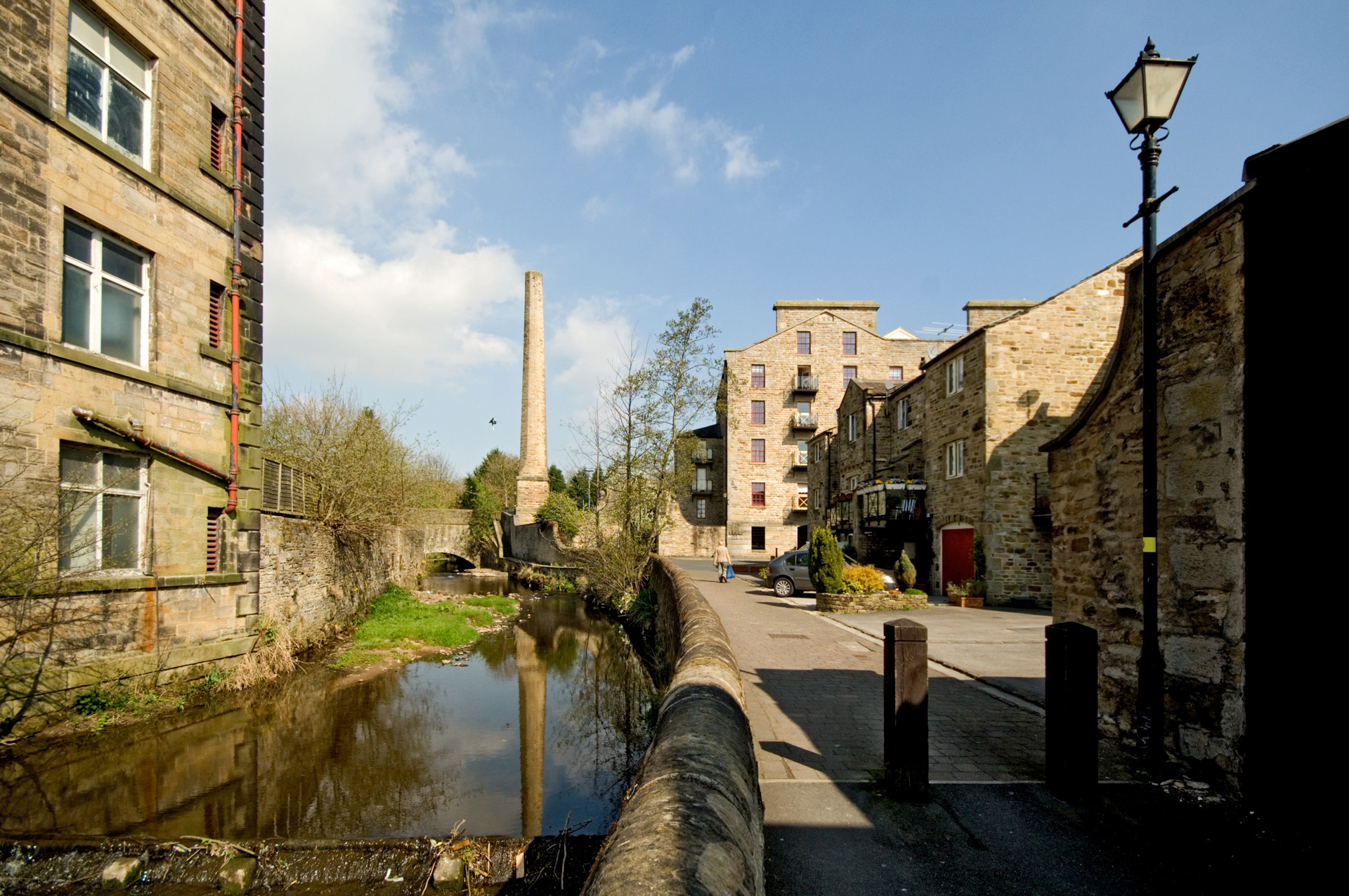 View along waterway to mill chimney and conversion, Skipton.