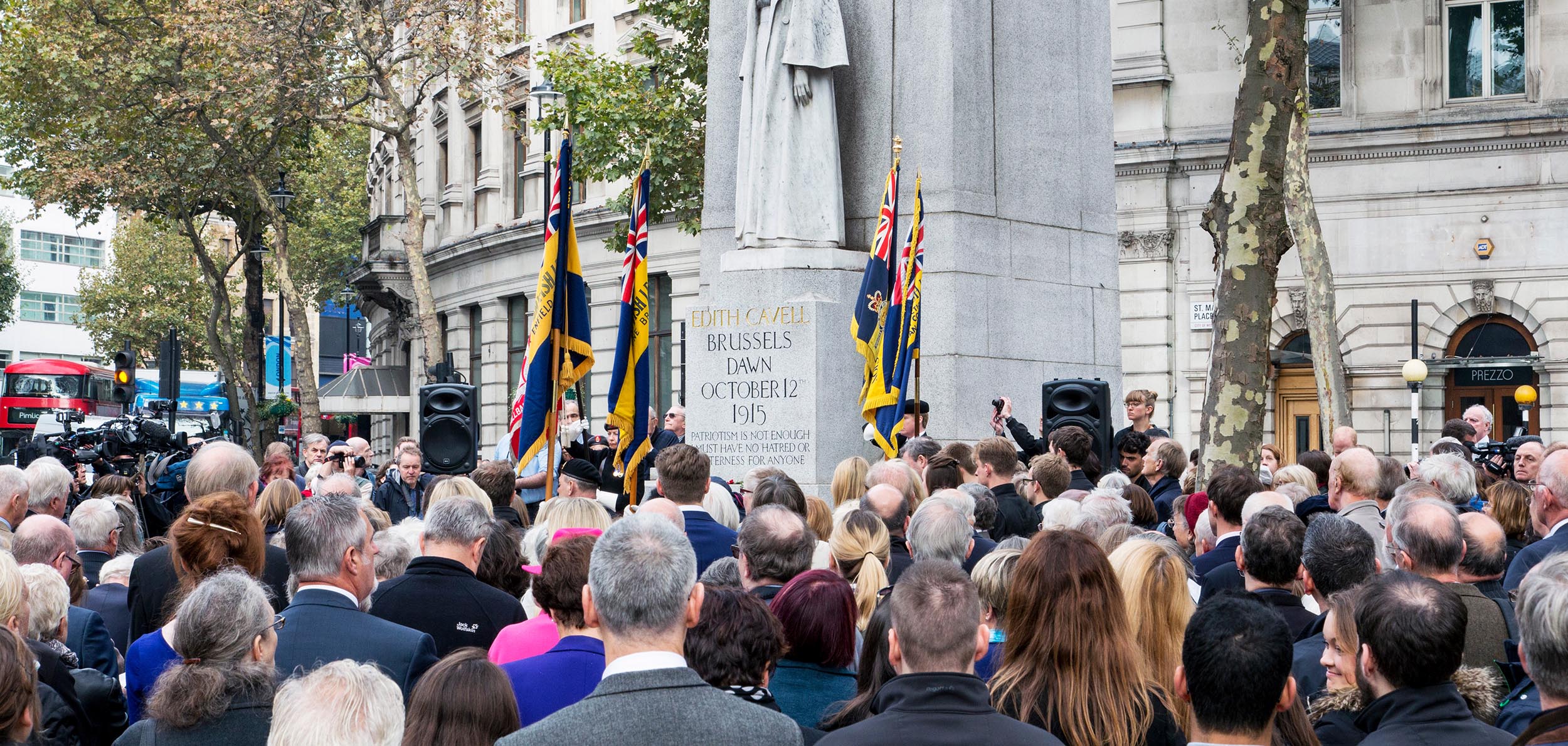 Photo of a crowd of people at Edith Cavell Memorial by Sir George Frampton