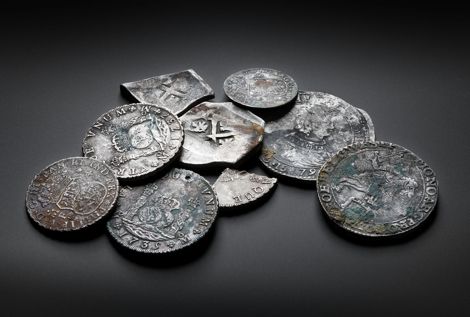 Collection of the different coins that were found in the wreck of the Rooswijk.