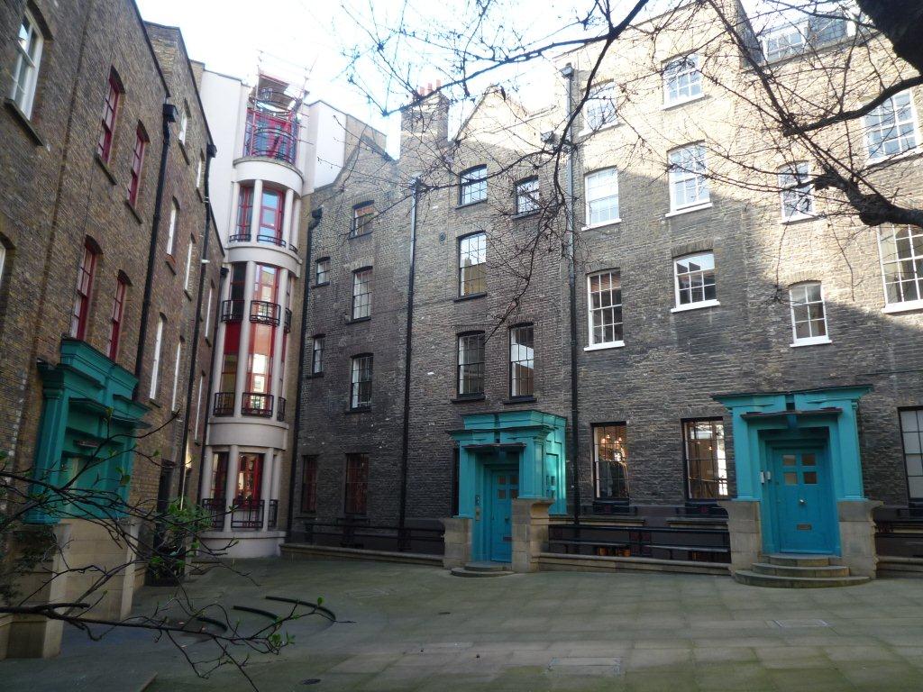 Image of Ching Court, the public space at the heart of Sir Terry Farrell's Postmodernist development, Comyn Ching in Covent Garden, London. Two buildings in the scheme have been newly listed at Grade II