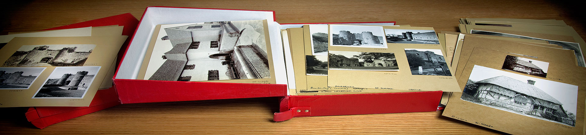 England's Places: An open red box with a series of cards displayed on a table