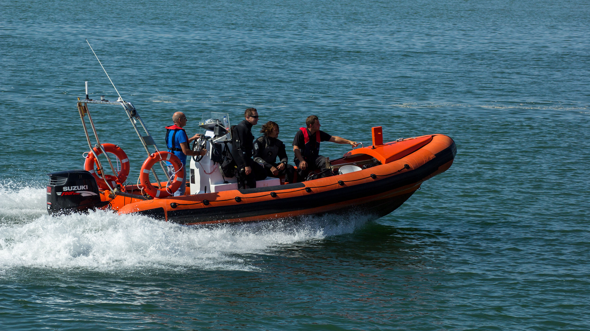 Image of the archaeologists and licensed diving team heading back to shore after working on the wreck site during a previous dive to the London. 