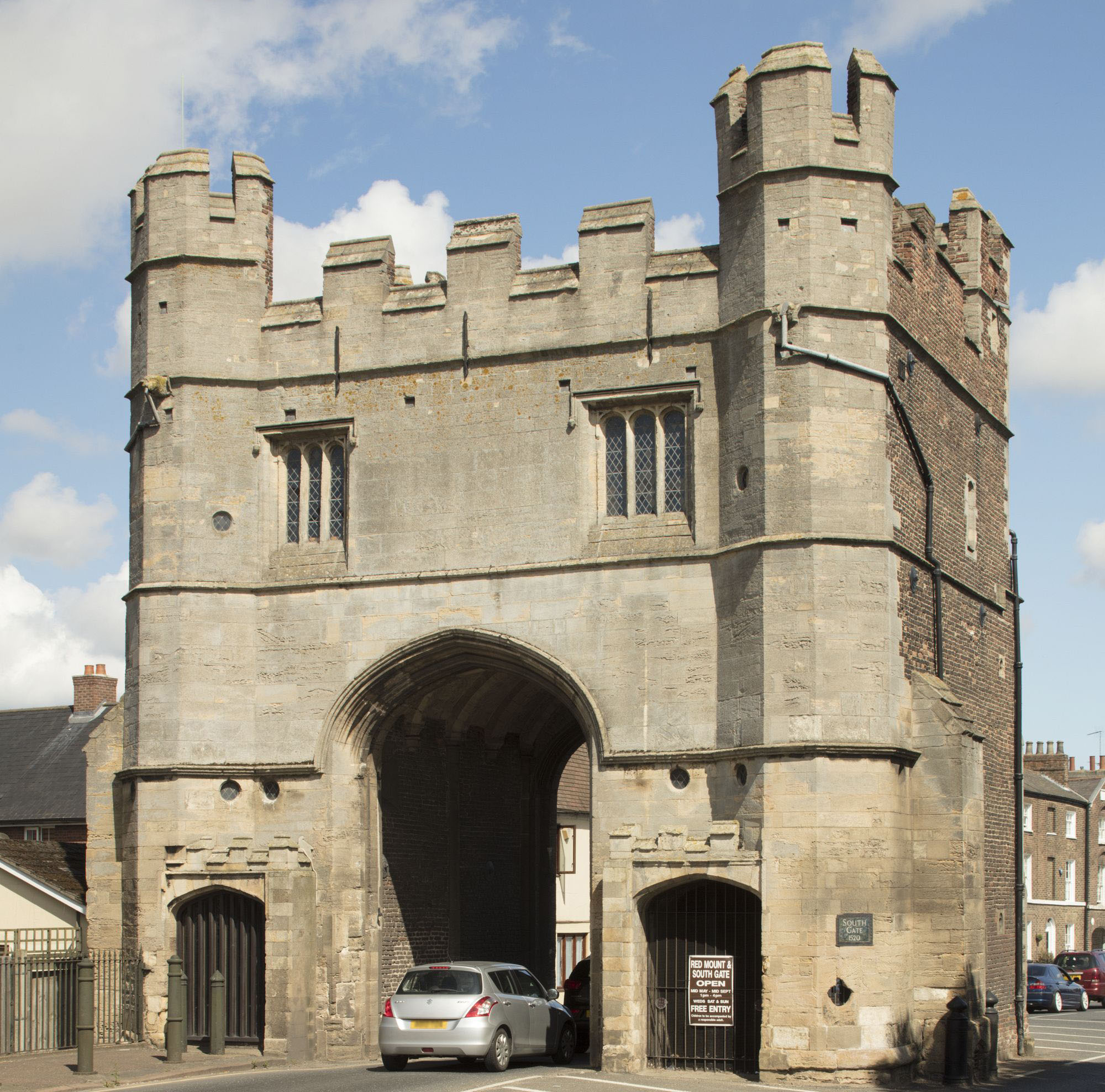 Car passing through the archway of South Gate