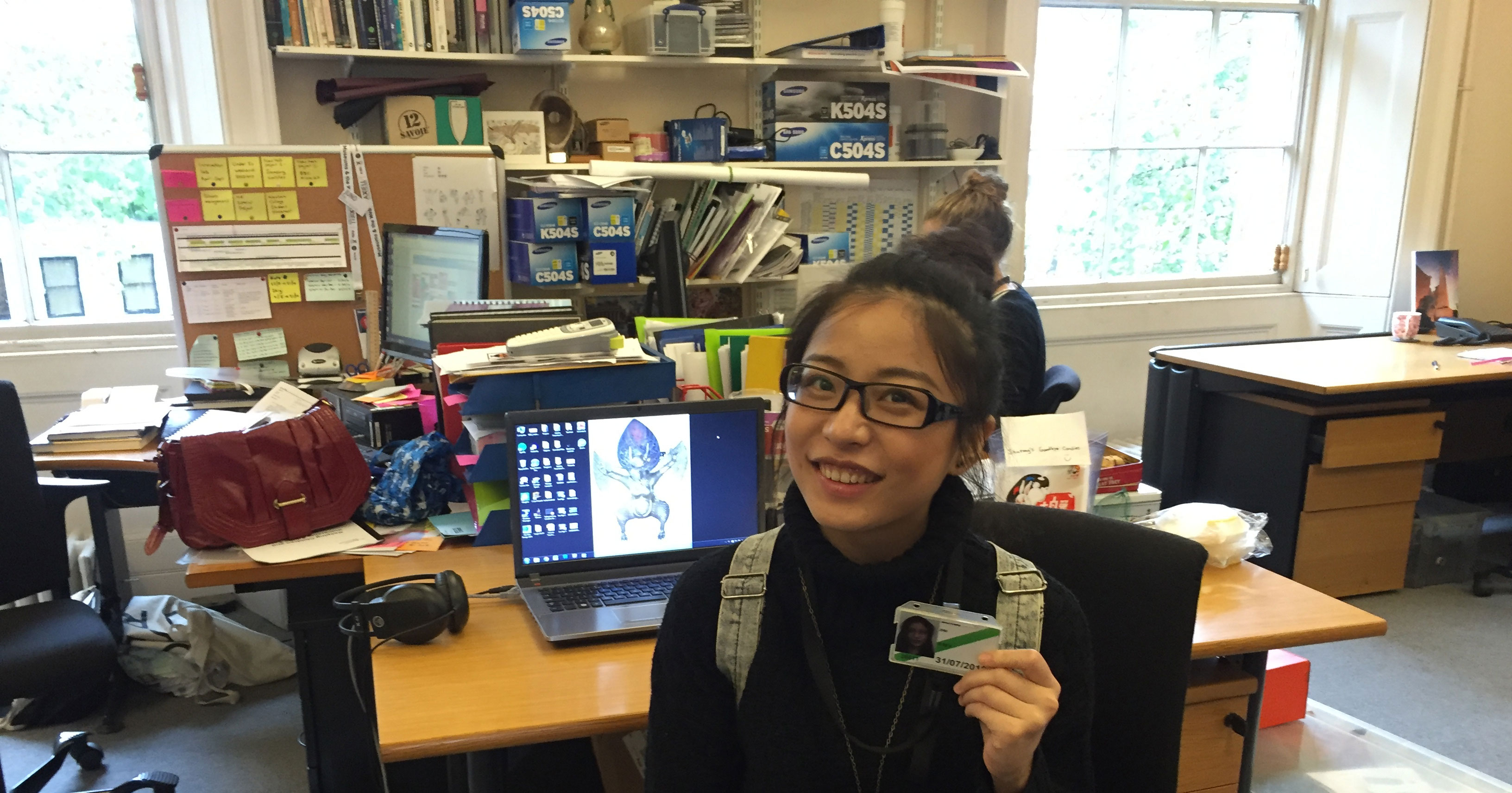 A Work Placement participant photographed in an office at the British Museum.