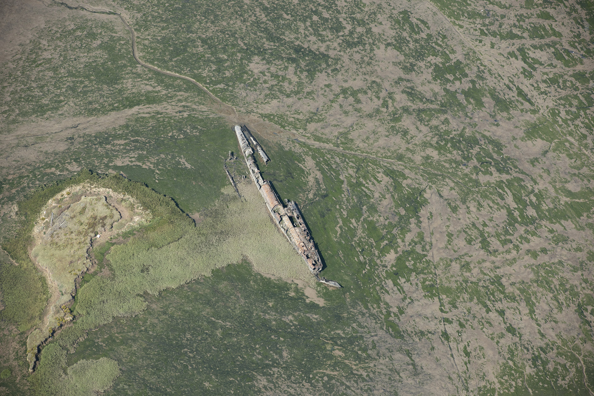 The River Medway, the rusting, skeletal remains of a German U-boat, believed to be UB122, which broke its tow while on its way to a scrapyard, lie preserved in tidal mudflats