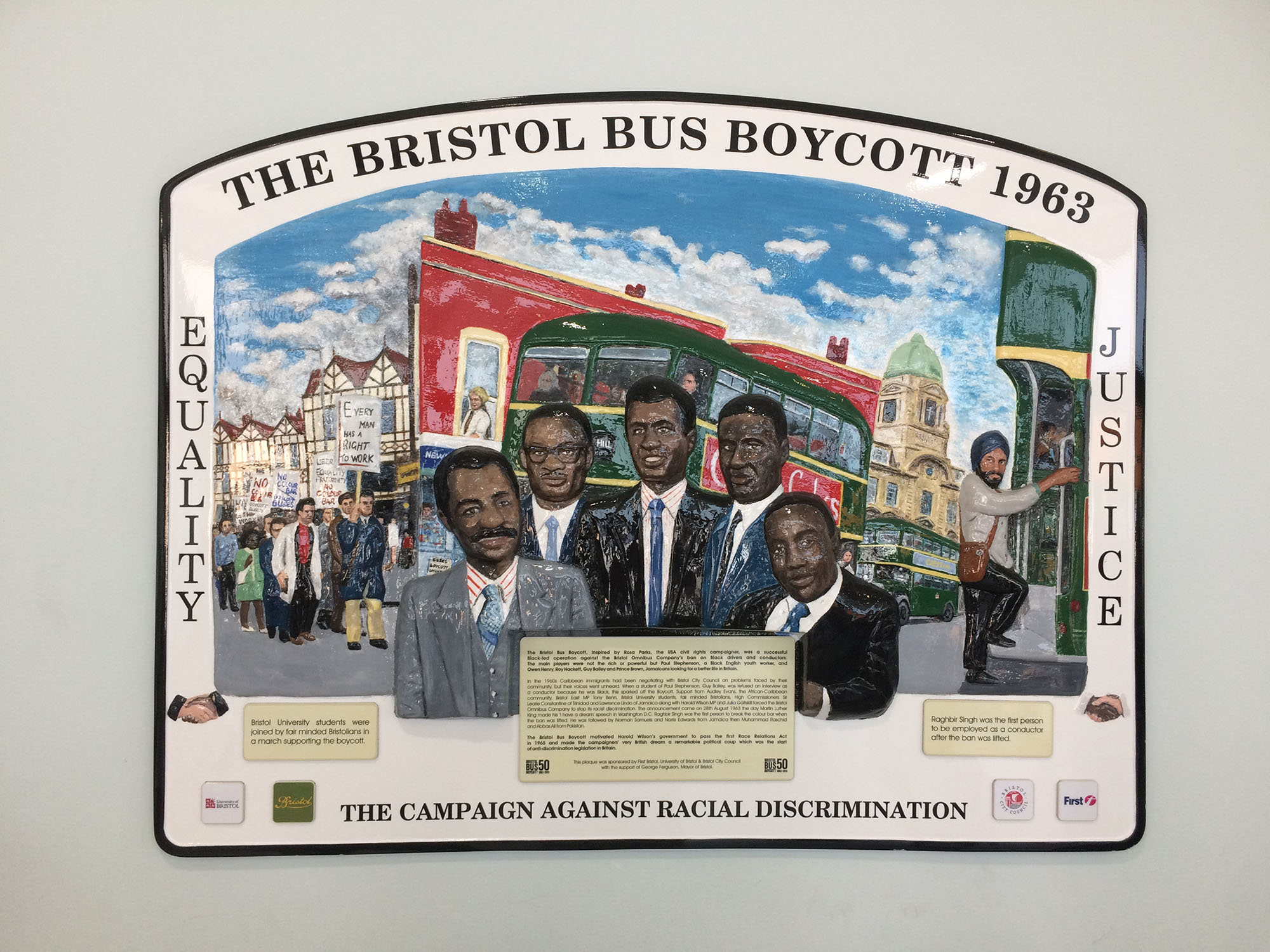 Plaque reads 'The Bristol Bus Boycott 1963, Equality, Justice, the campaign against racial discrimination' with a picture of 5 coloured men and a double decker bus in the background