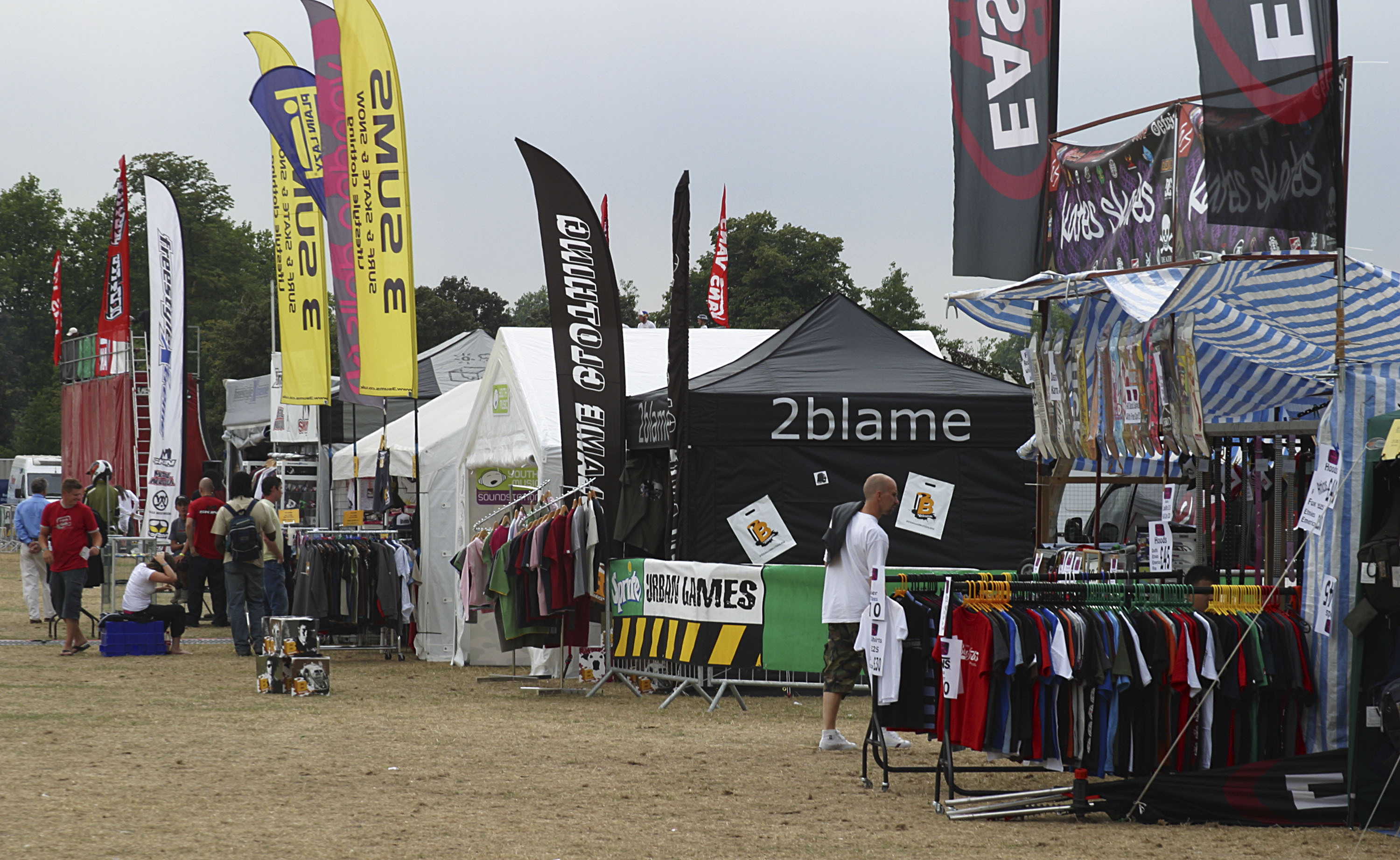 Attendees browsing merchandise stalls at Sprite Games in Clapham Common