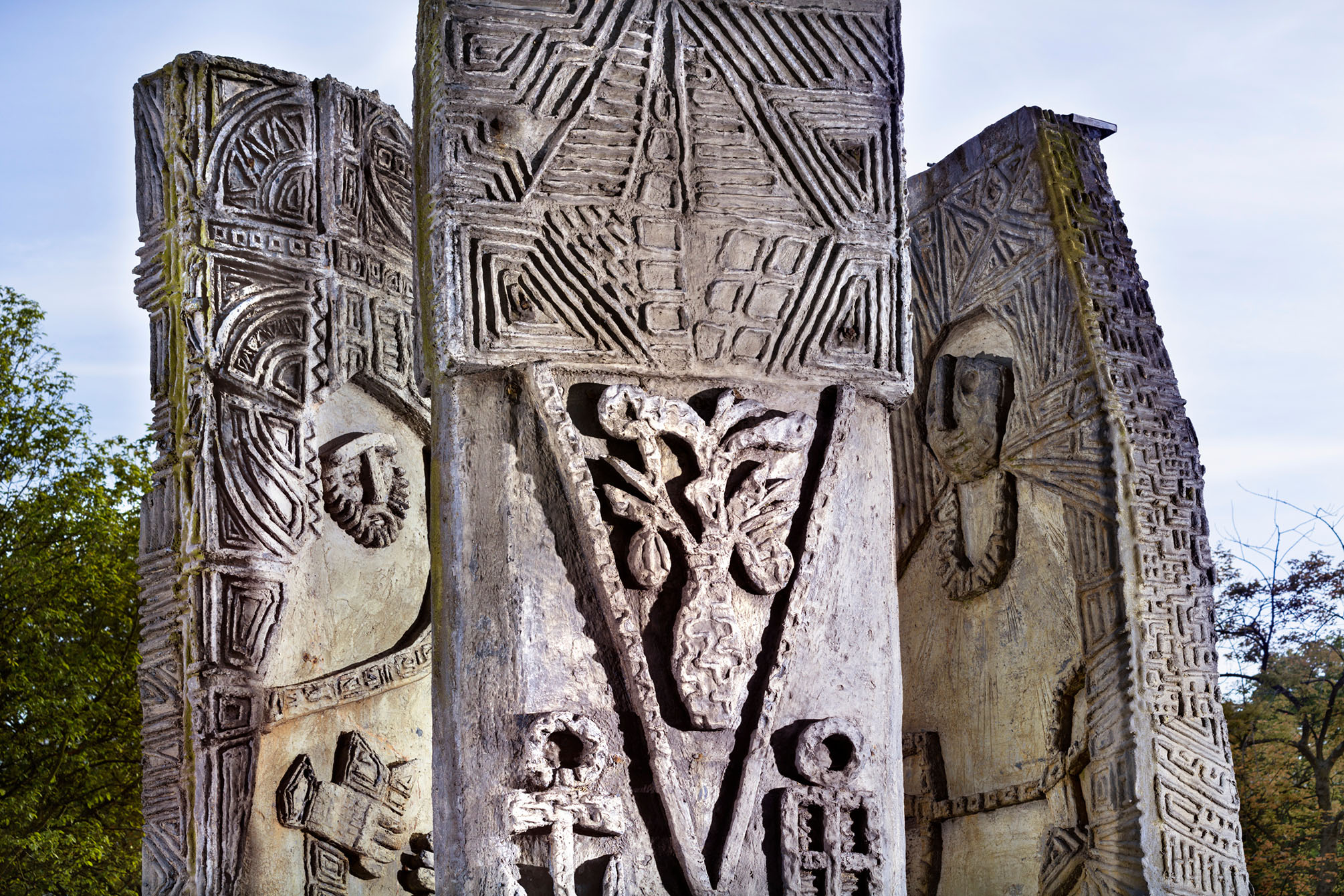 A detailed section of the Southend-on-Sea Civic Fountain shows three panels, with figures, a trefoil and decorative nautical motifs