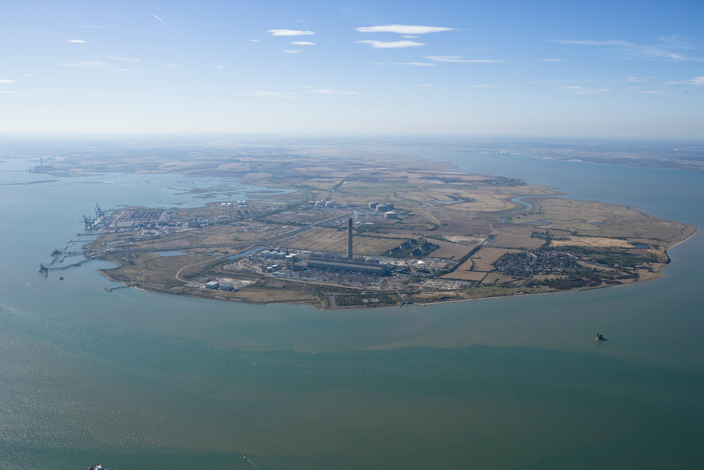 View looking west across the Hoo Peninsula with the Grain industrial area in the foreground.