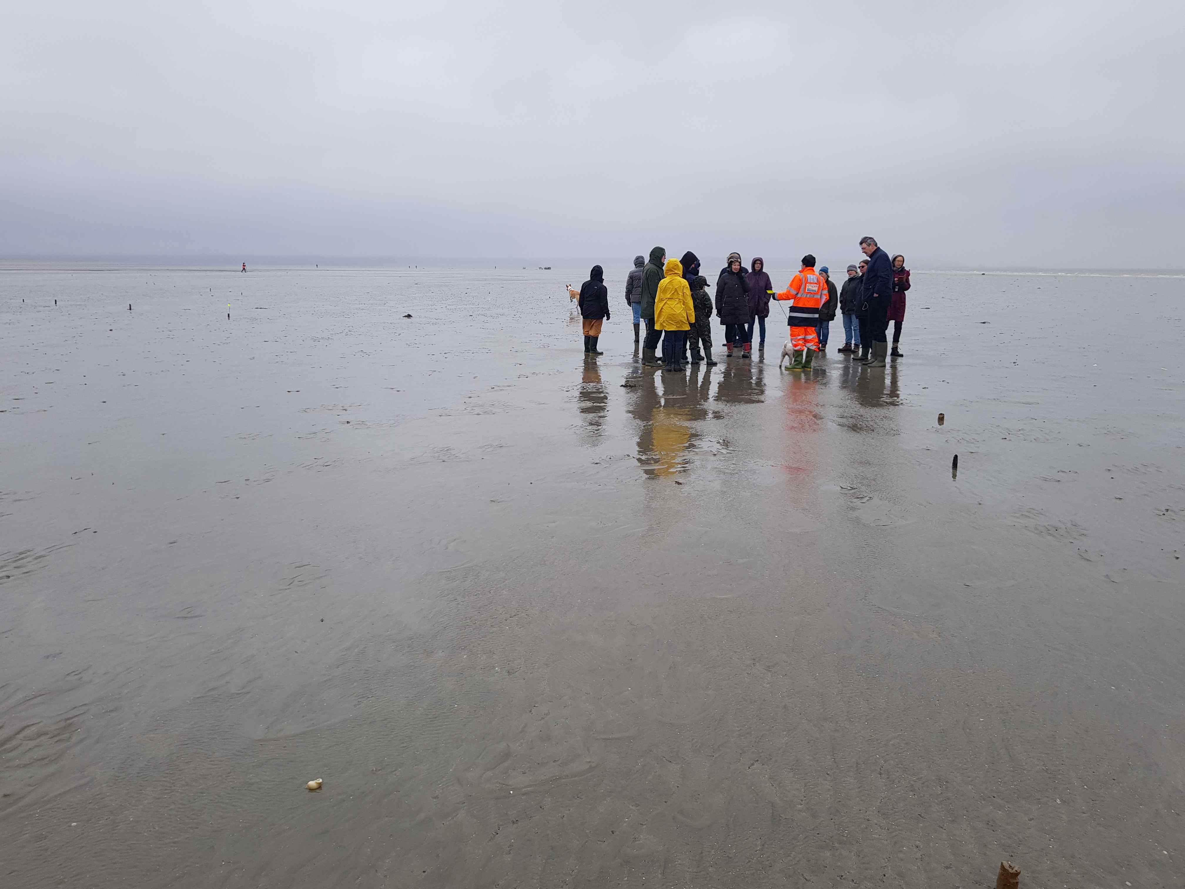 Image of group of people on the beach at Sandwich Bay, Kent.