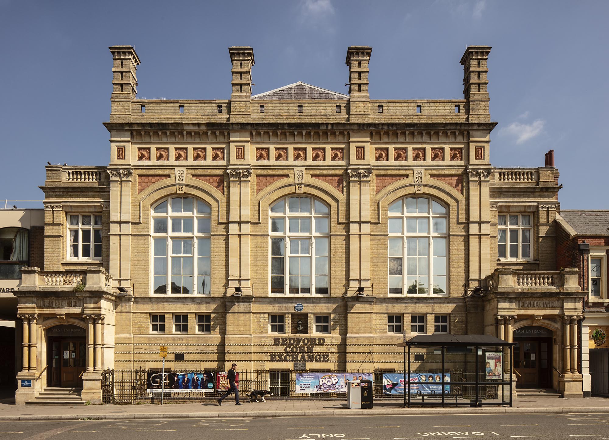 Bedford Corn Exchange is a five-bay, two-storey building. The roof has a slate covering and the walls are constructed of white brick with Bath stone cornices and pennant stone dressings.


