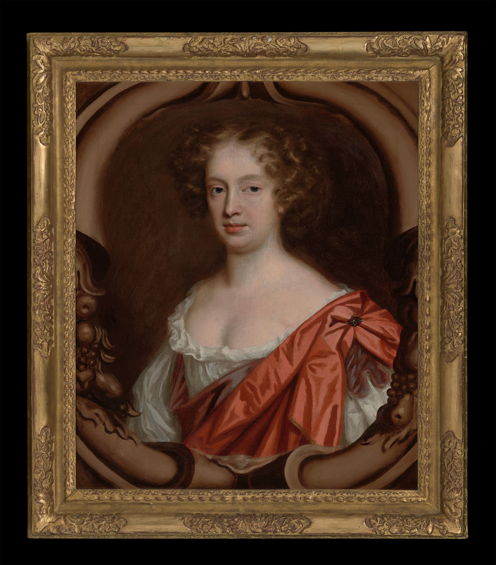 An 17th century oil painting portrait of Mary Beale. The sitter wears a white dress with a red sash, her hair is curled and pinned back. The portrait is in an ornate gilt frame.
