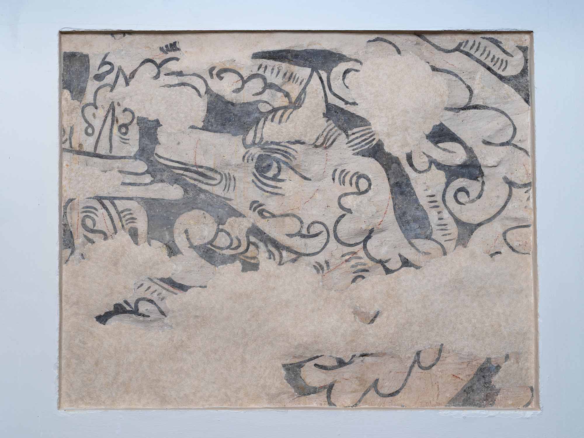 Detail of a wall painting resembling a fox or dog.