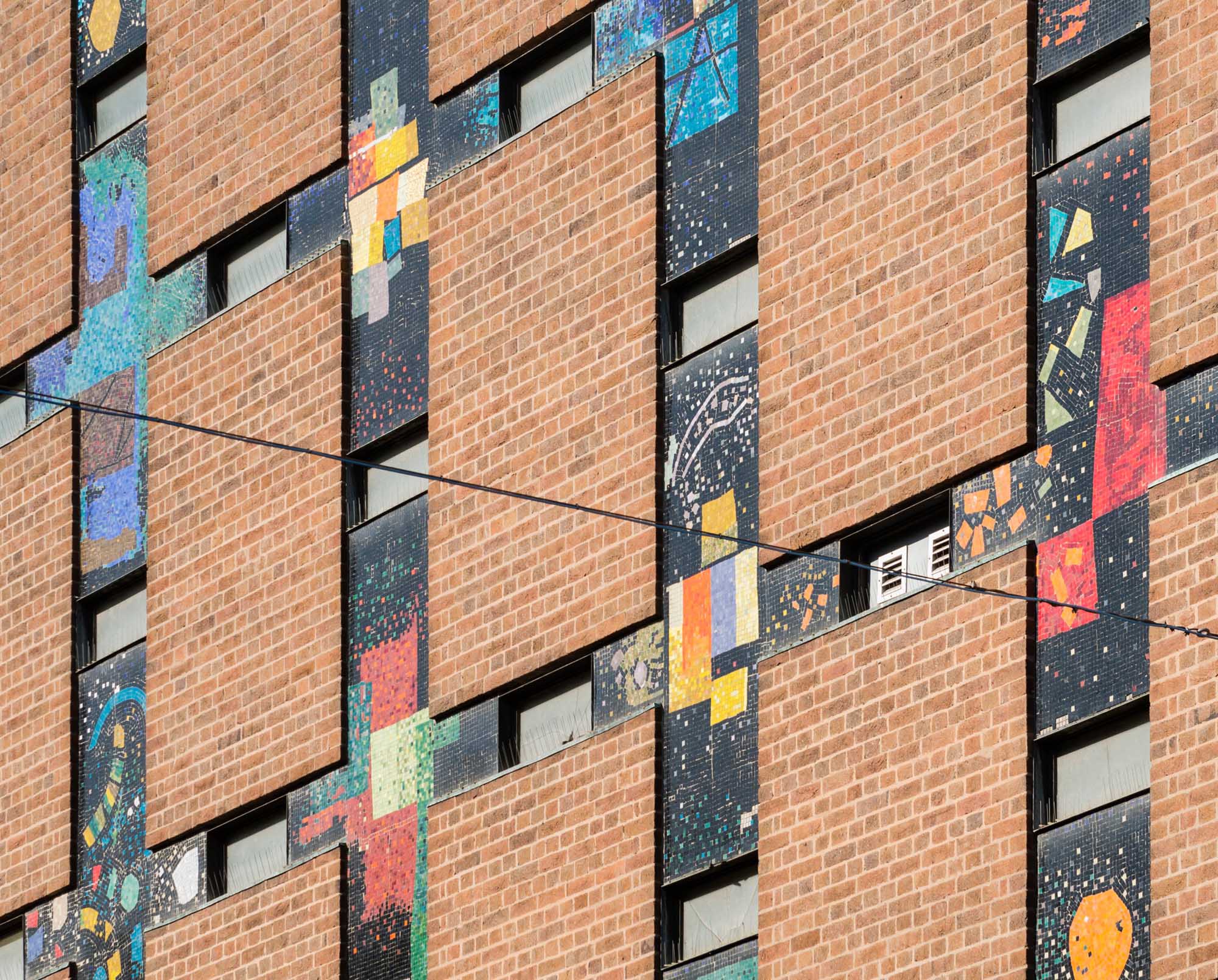Locarno dancehall (now City Library), Smithford Way, Coventry. Exterior detail of coloured mosaic tiles. © Historic England