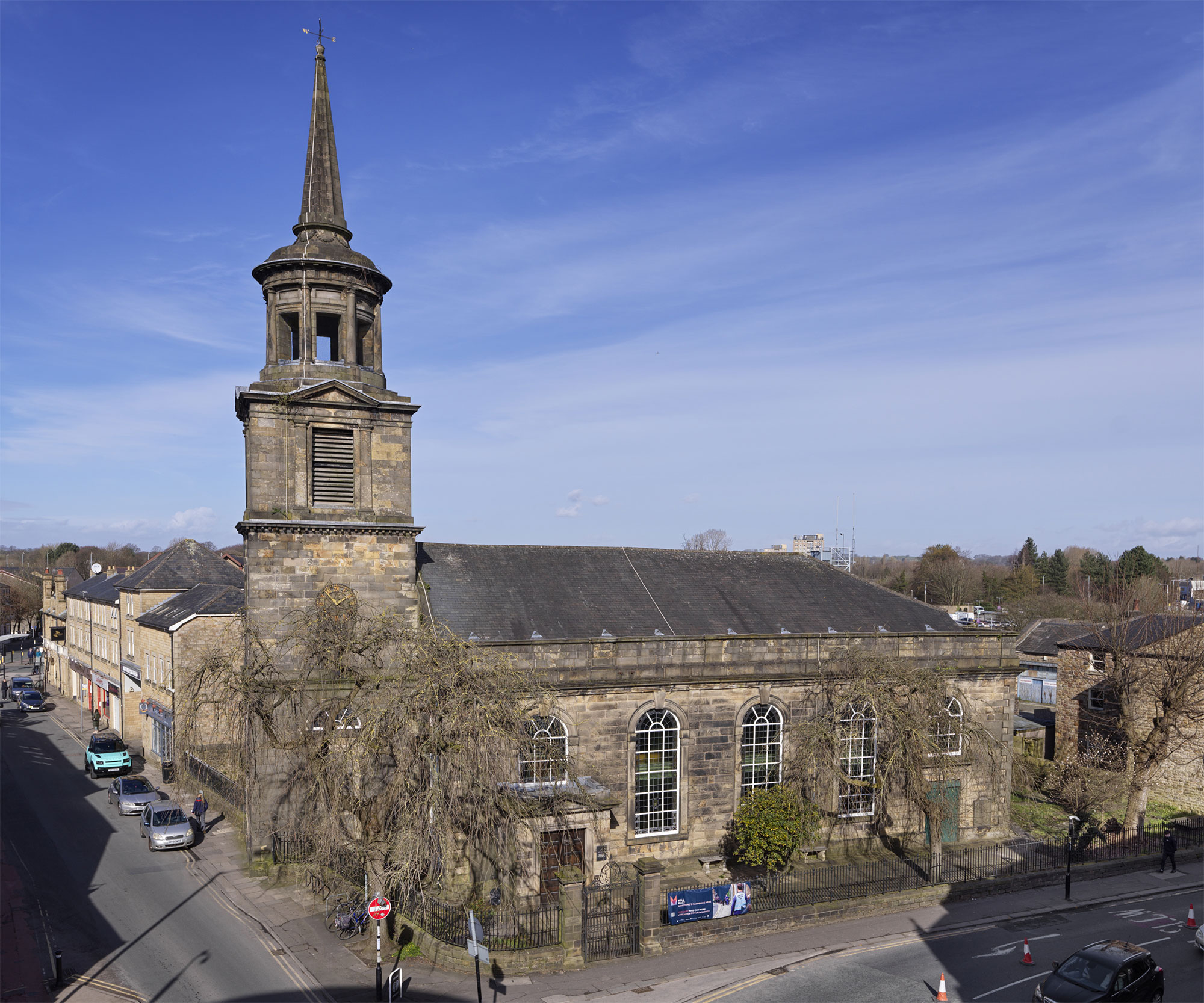 Church with tower against blue sky