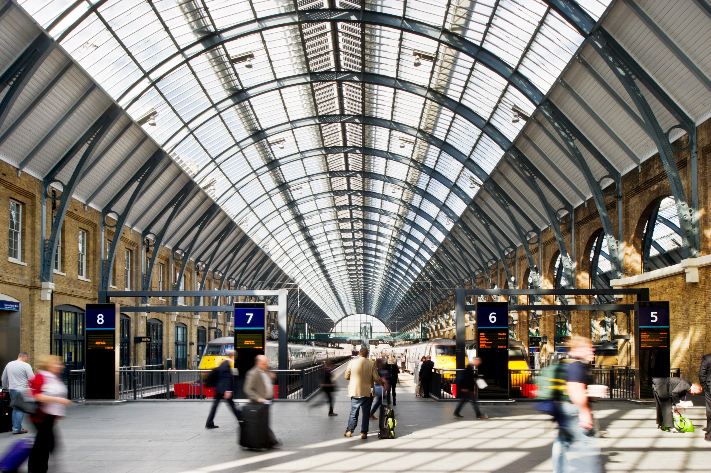 View down platforms 5, 6, 7 and 8 of King's Cross Station.