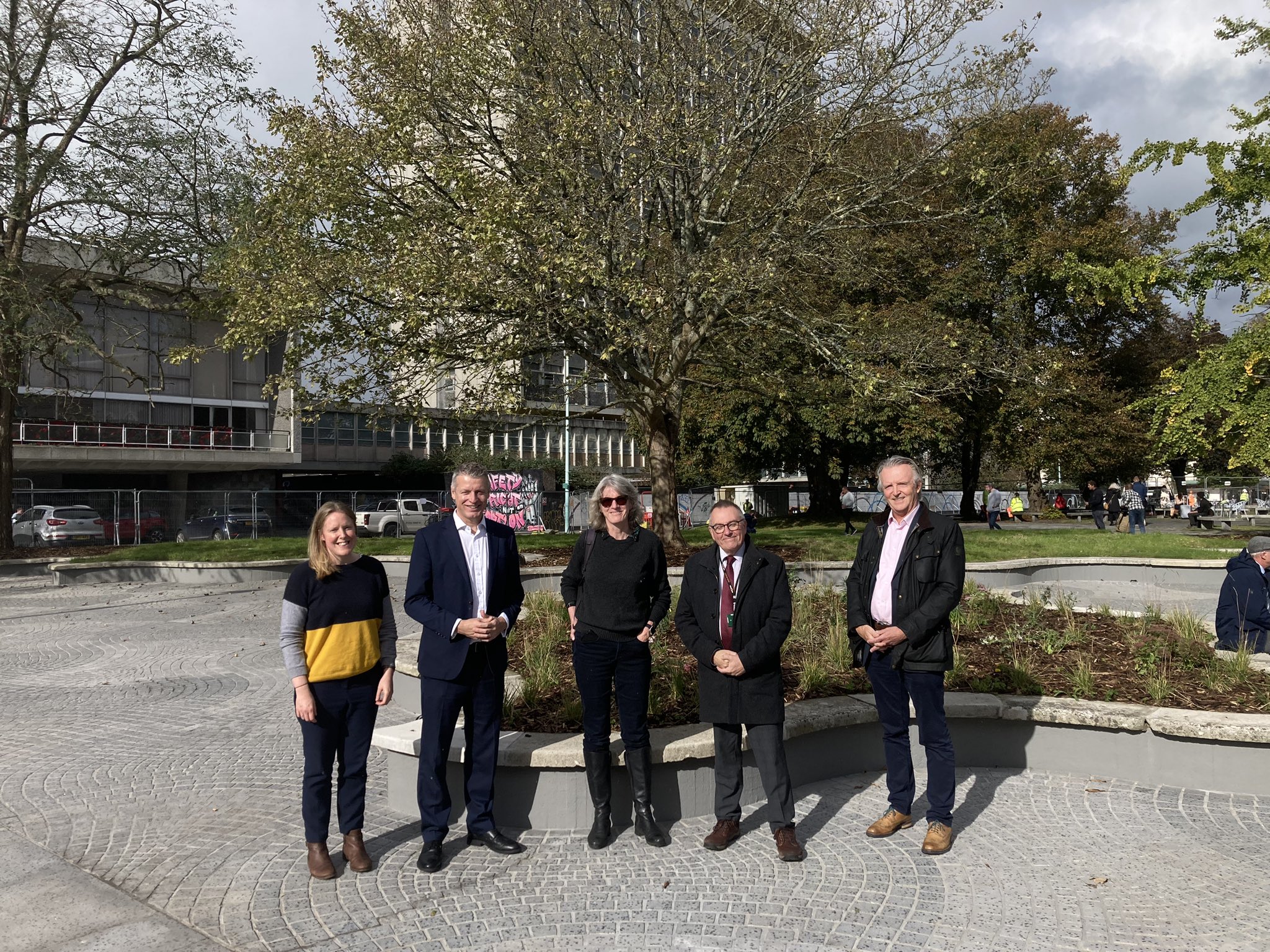 Five people visit Plymouth's Civic Square with newly repaired paving and street furniture