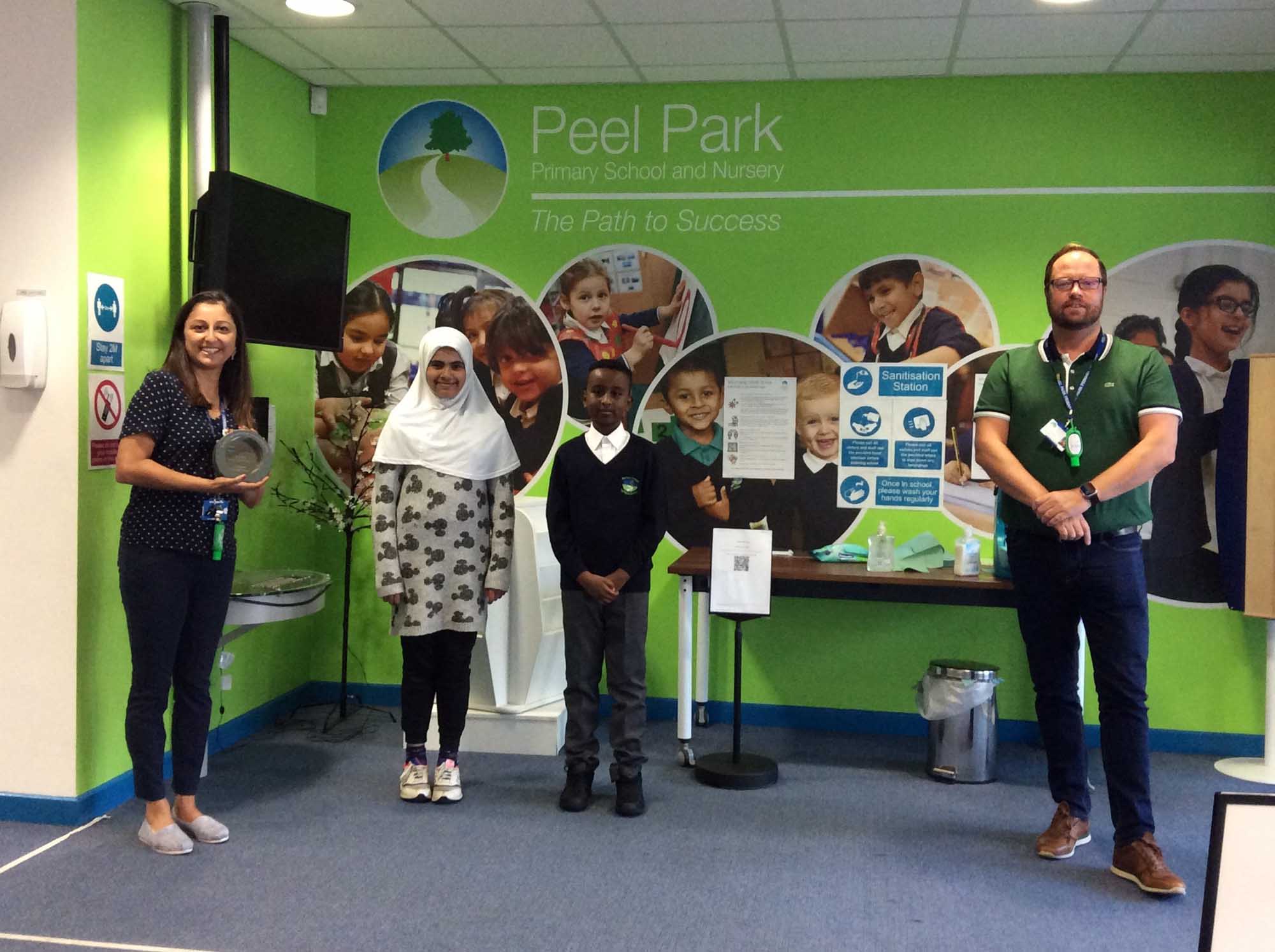 Teachers and pupils from Peel Park Primary School and Nursery with their Champion Heritage Schools Award.