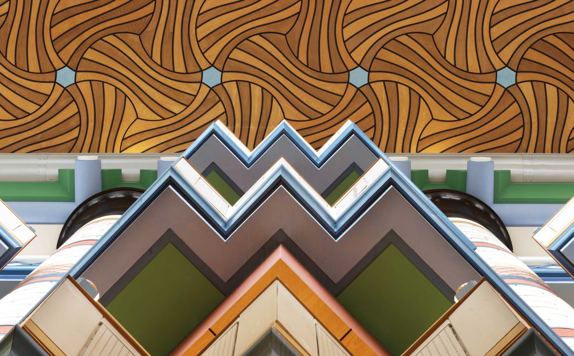 View of the main atrium, ceiling and balcony by architect John Outram. Judge Institute of Management Studies, Trumpington Street, Cambridge. Grade II* listed
