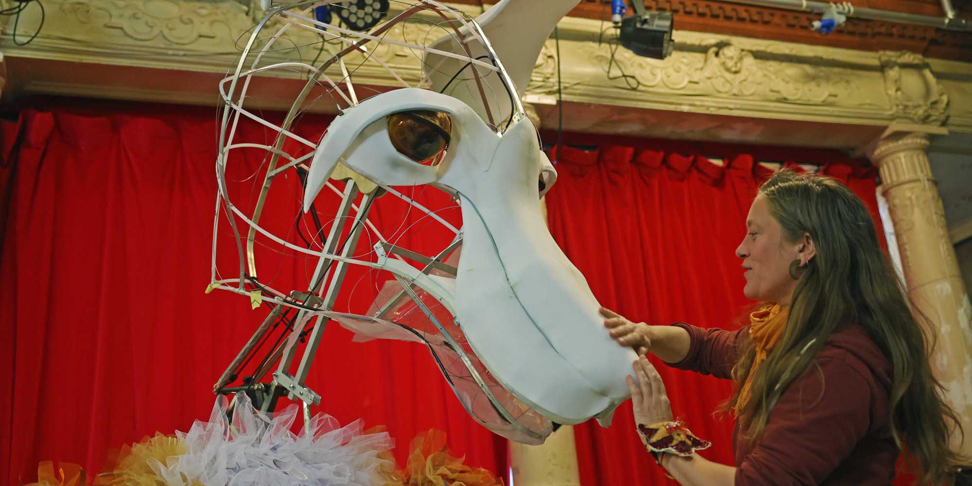 A sculptor builds a larger-than-life fox puppet. 