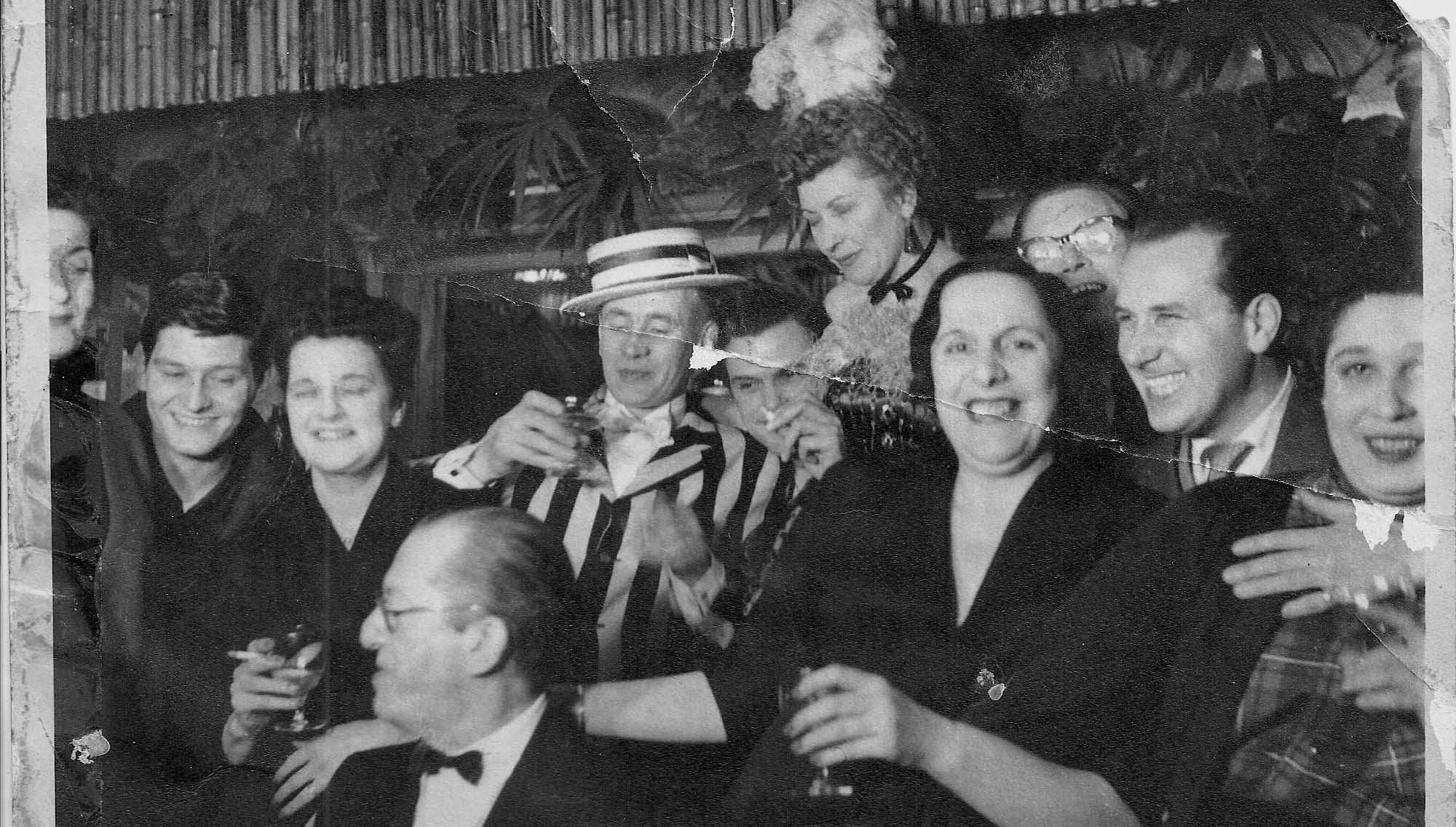 Black and white photo of people at Colony Club