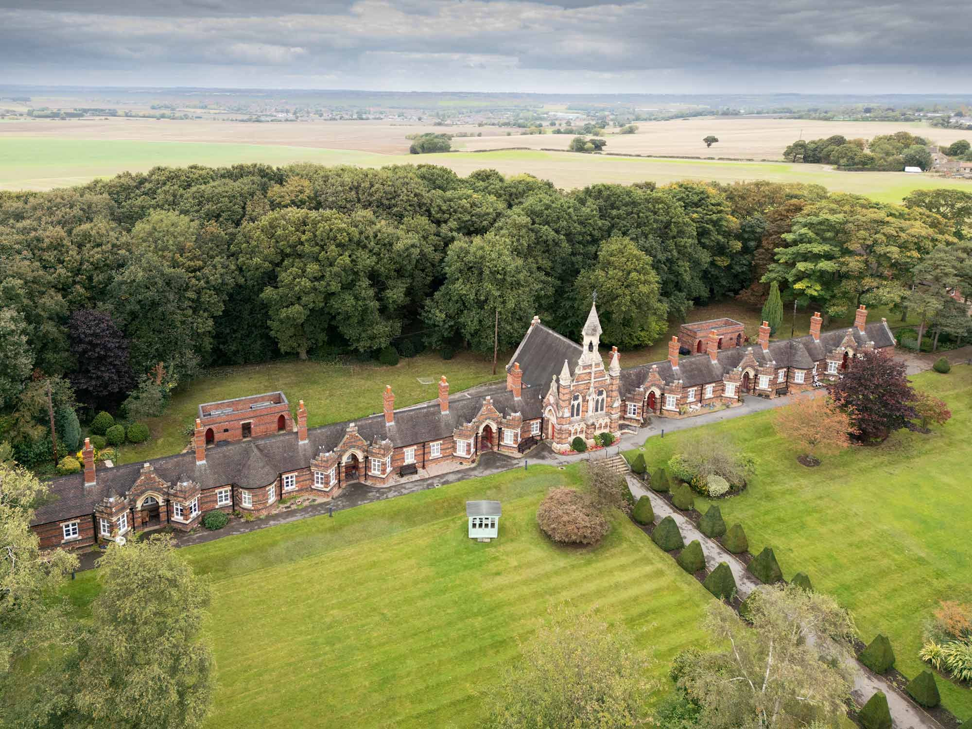 Oblique aerial view from the south-west showing the north range of Holgate's Hospital.
