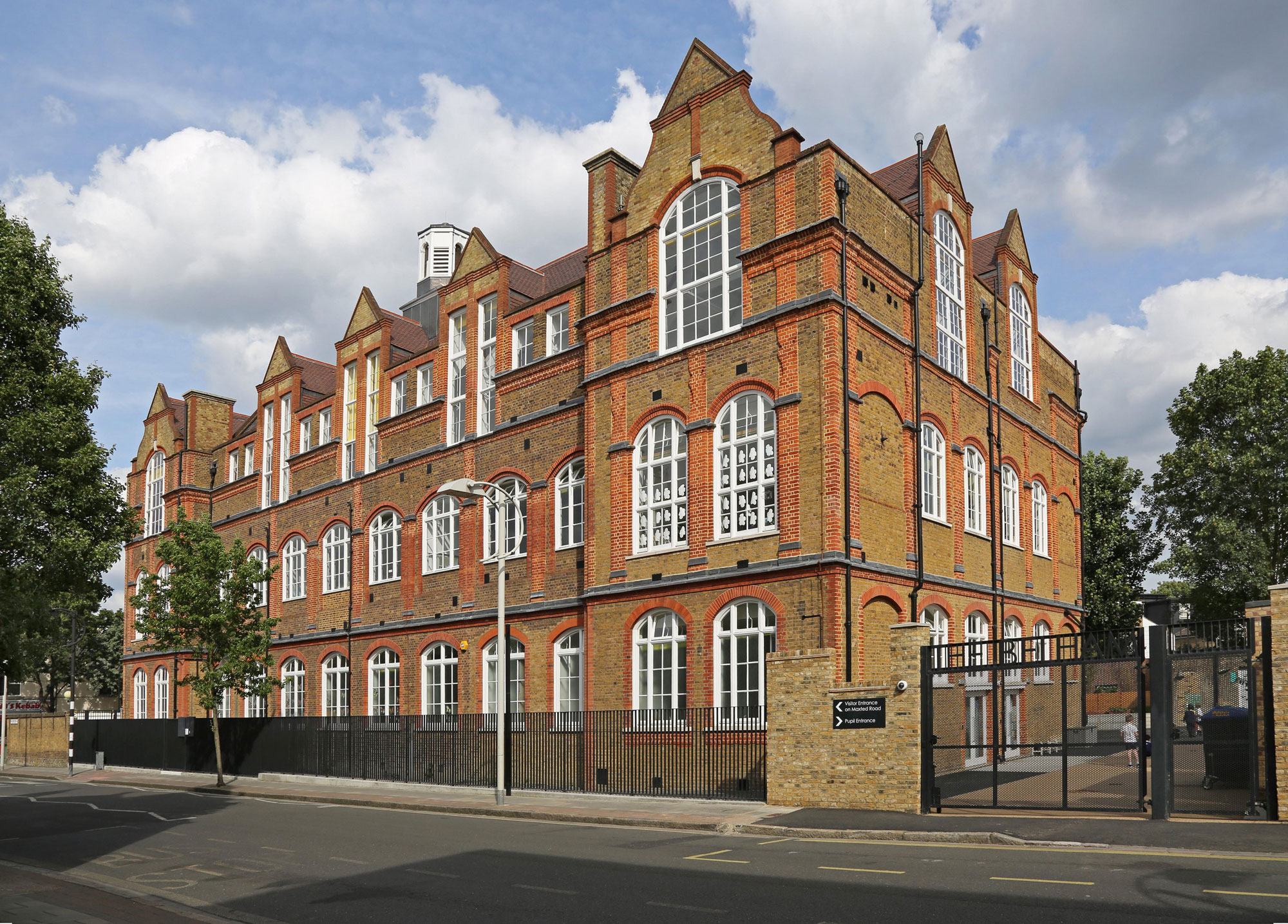 A 3-storey brick school building.