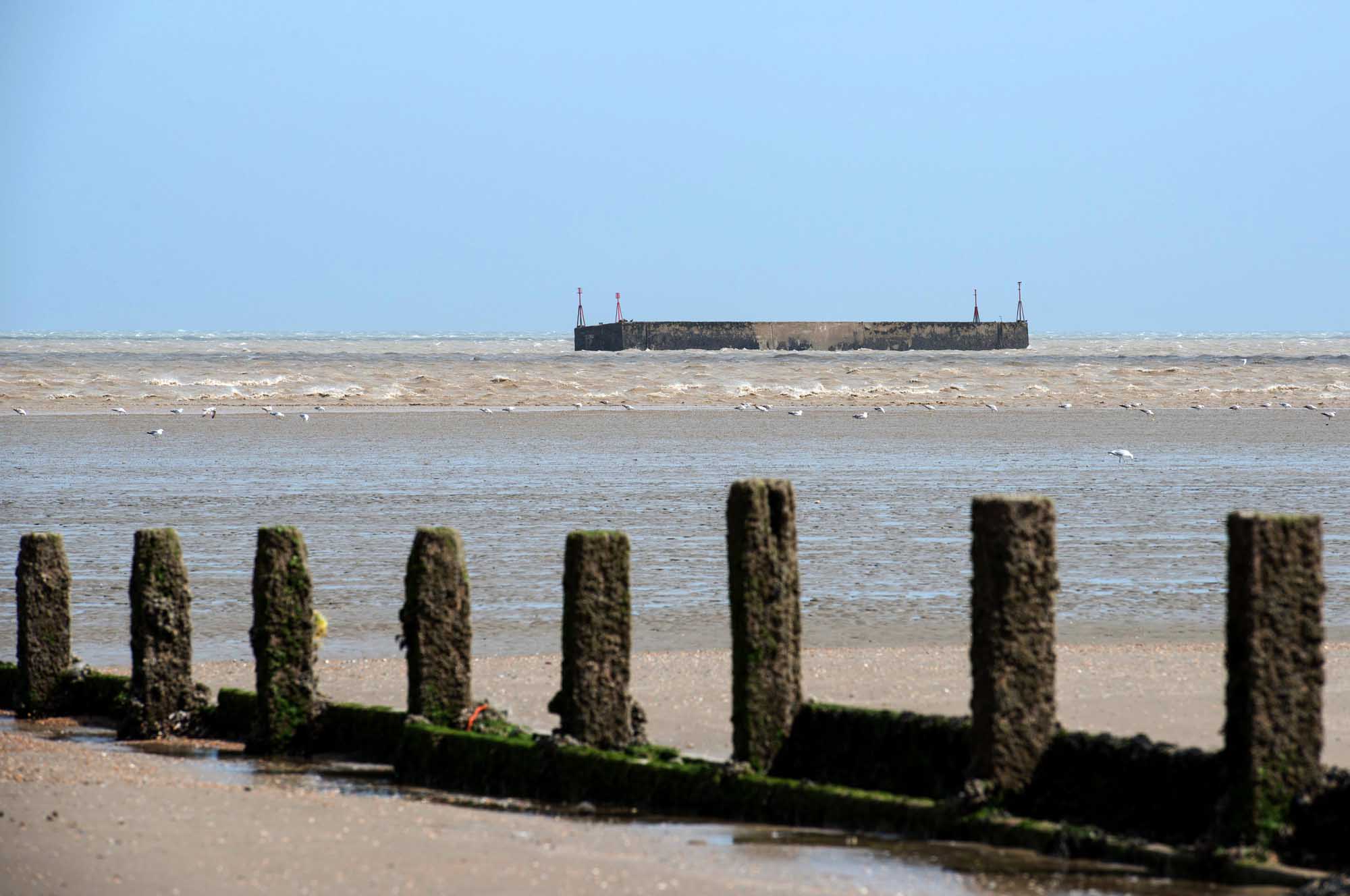 Phoenix Caisson off the coast of Littlestone-on-Sea, Kent. The huge concrete structure was part of the Mulberry Harbour plan to create landing stages in France to support the D-Day invasion.