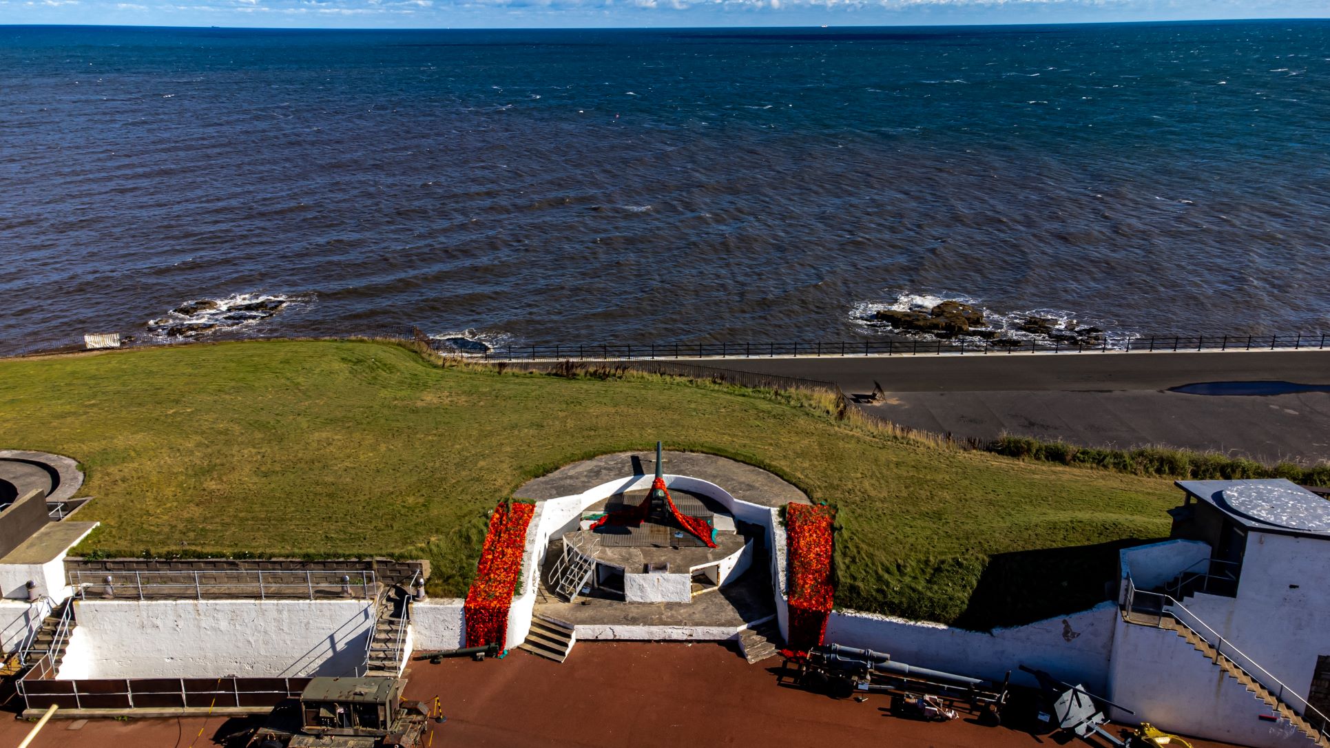 Aerial view of a coastal artillery battery next to the sea.