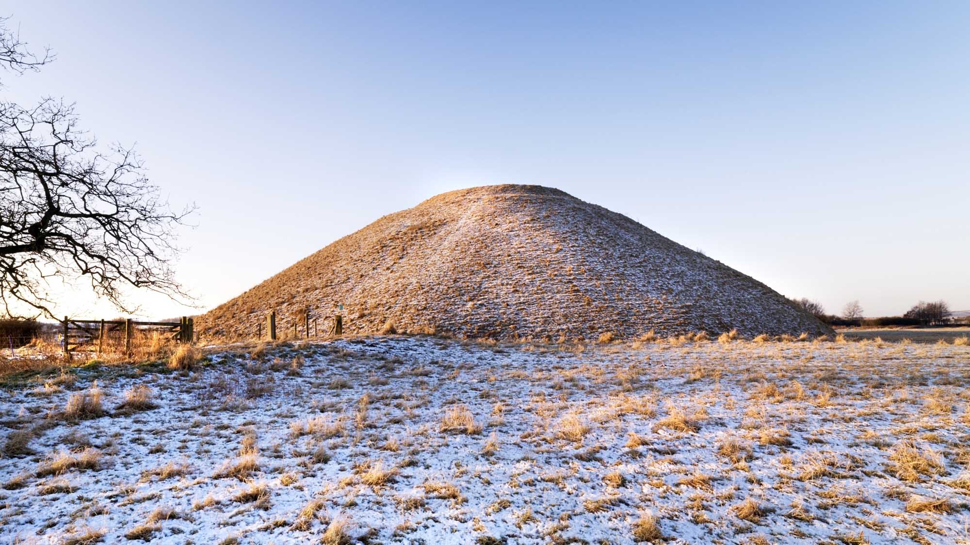 Silbury Hill, Avebury. View across a frost laden field looking towards Silbury Hill.