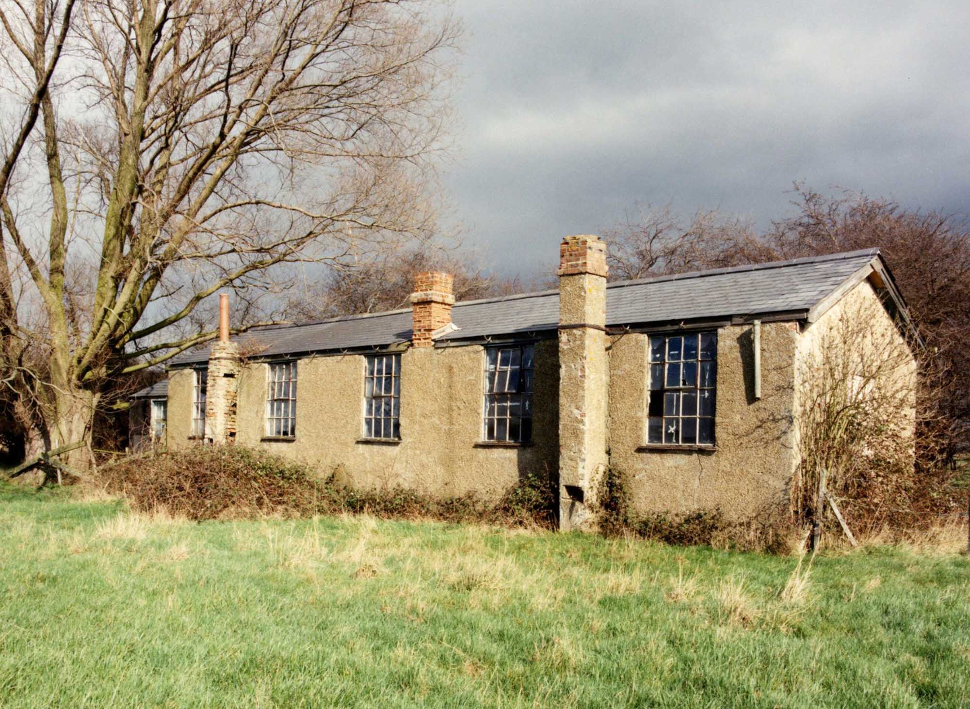 Stow Maries airfield, Essex, the single storey non-commissioned officers’ quarters, with its cast iron windows, projecting chimney stacks and slate roof remains virtually unaltered from a century ago