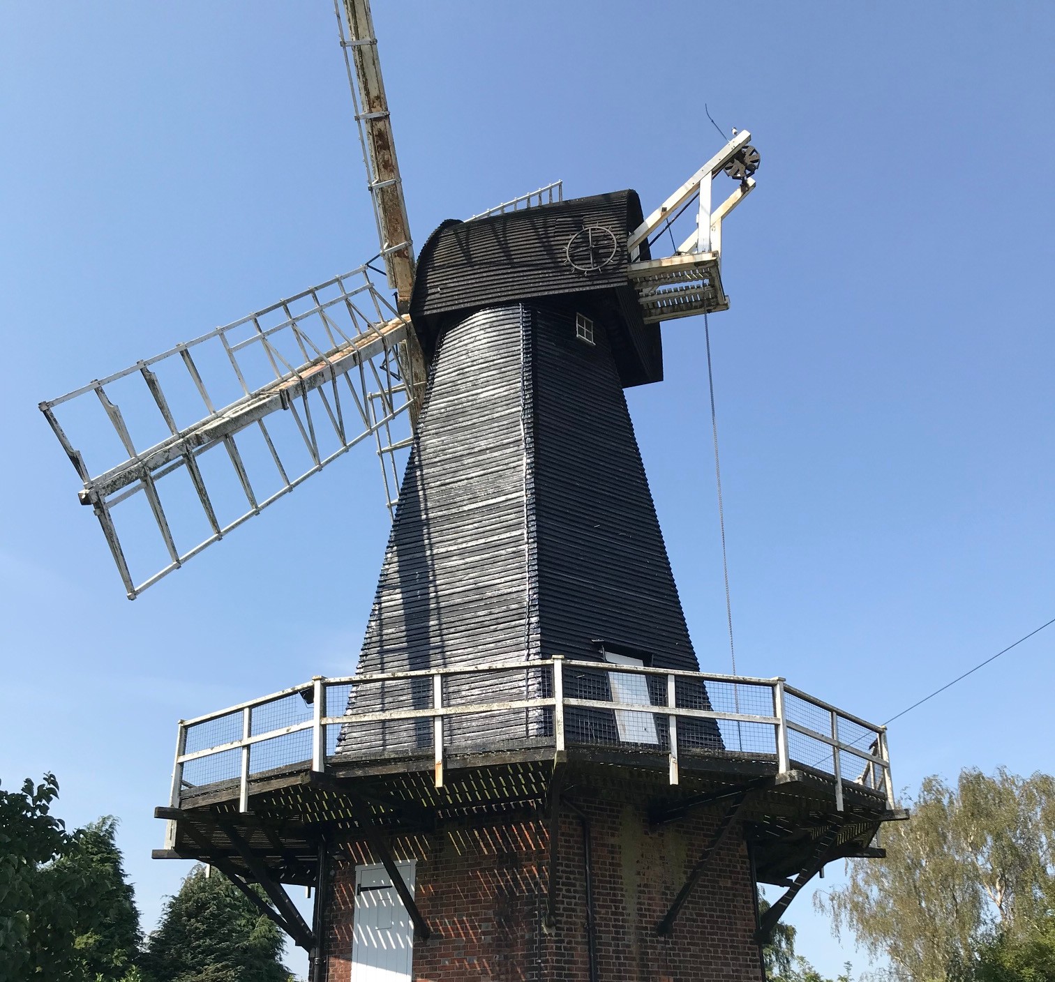 Portrait photograph of Meopham Windmill on a sunny summer day. 